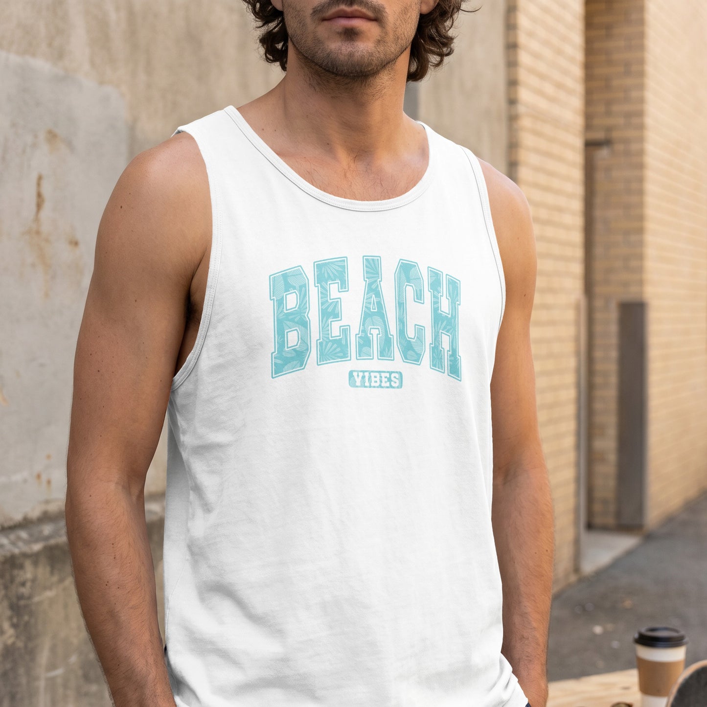 White men's tank top with "BEACH VIBES" in blue palm leaf font.