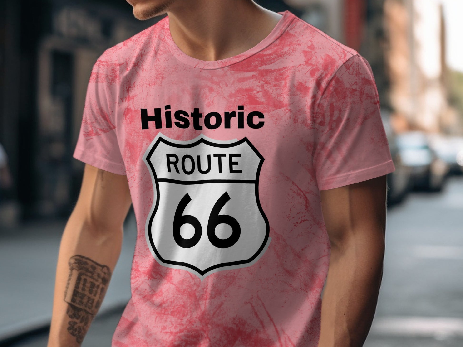 Pink t-shirt with Historic Route 66 shield logo on front.