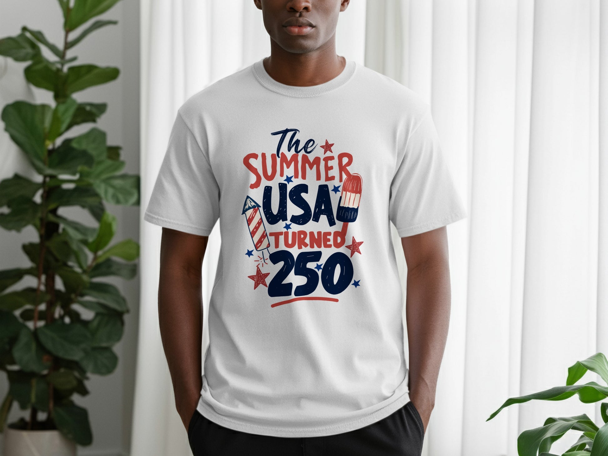 White t-shirt with "The Summer USA Turned 250" text and patriotic graphics.