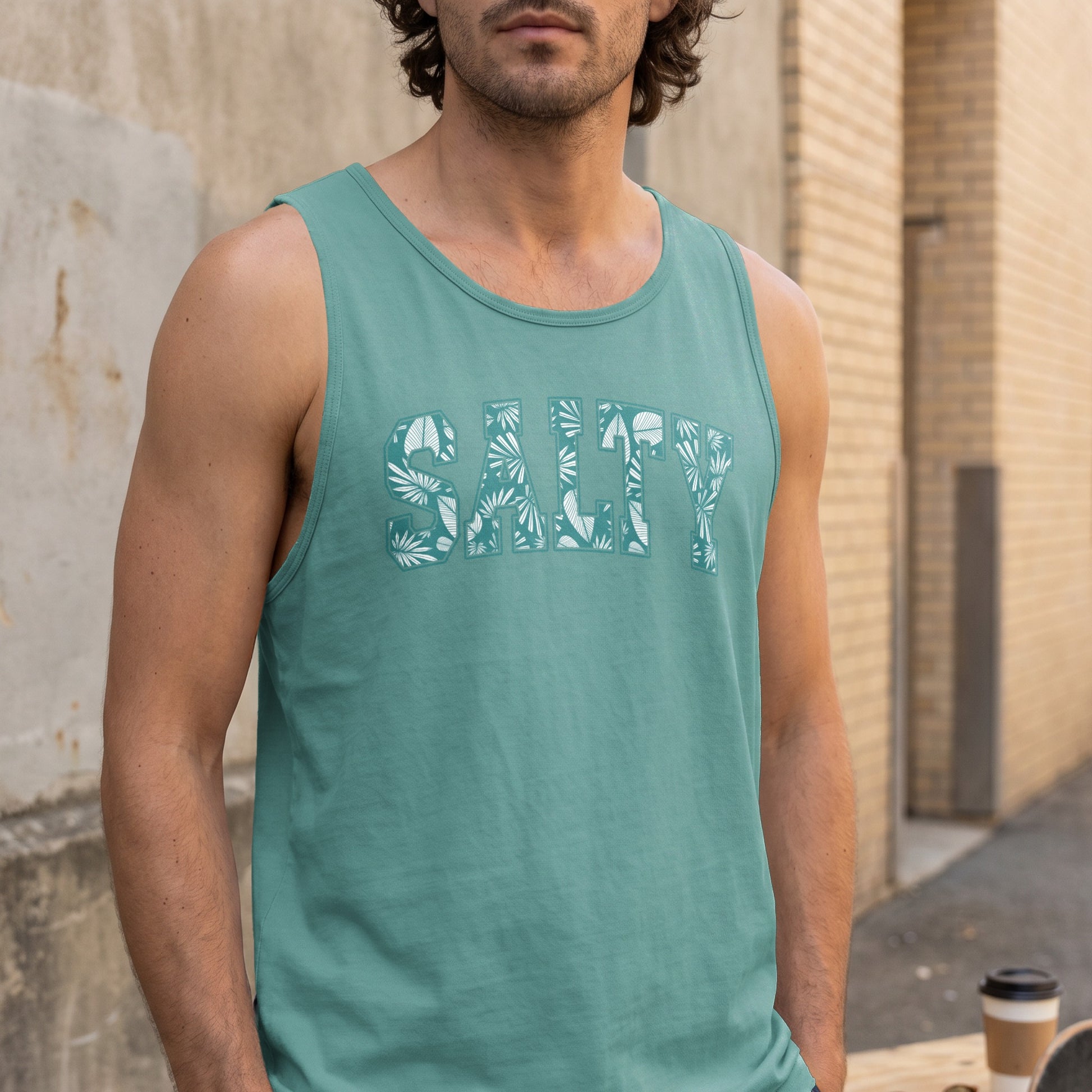 Teal tank top with "SALTY" in a floral pattern.