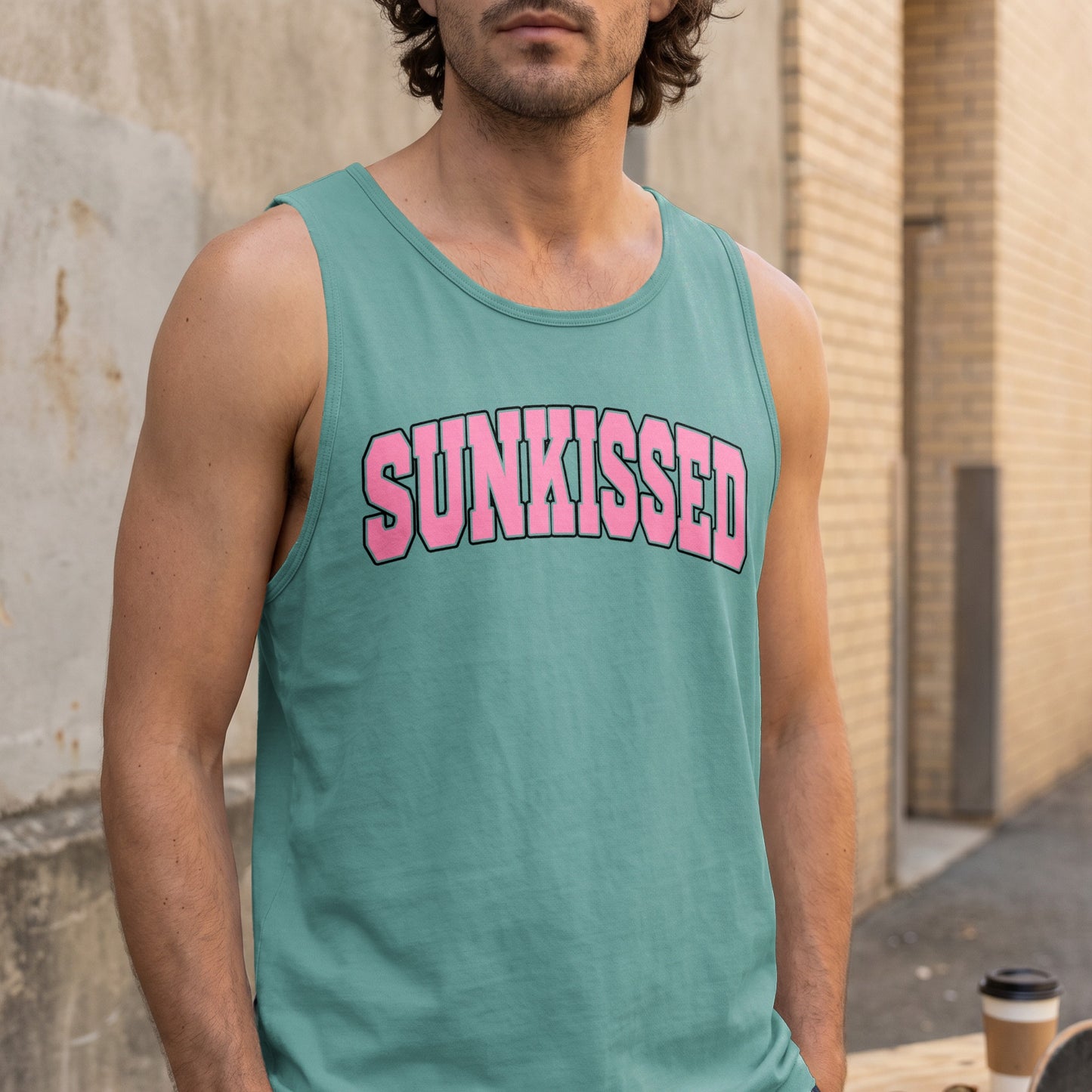 Teal tank top with "SUNKISSED" in pink bubble letters across the chest.
