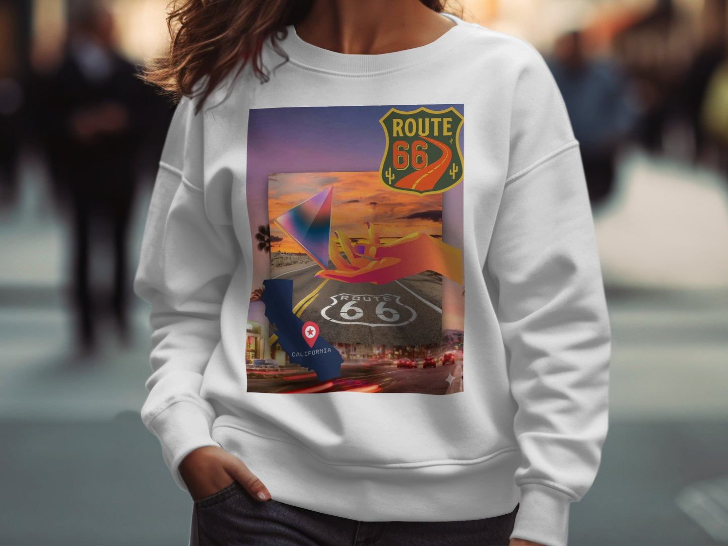 Route 66 graphic on a white sweatshirt, featuring a stylized road and California.