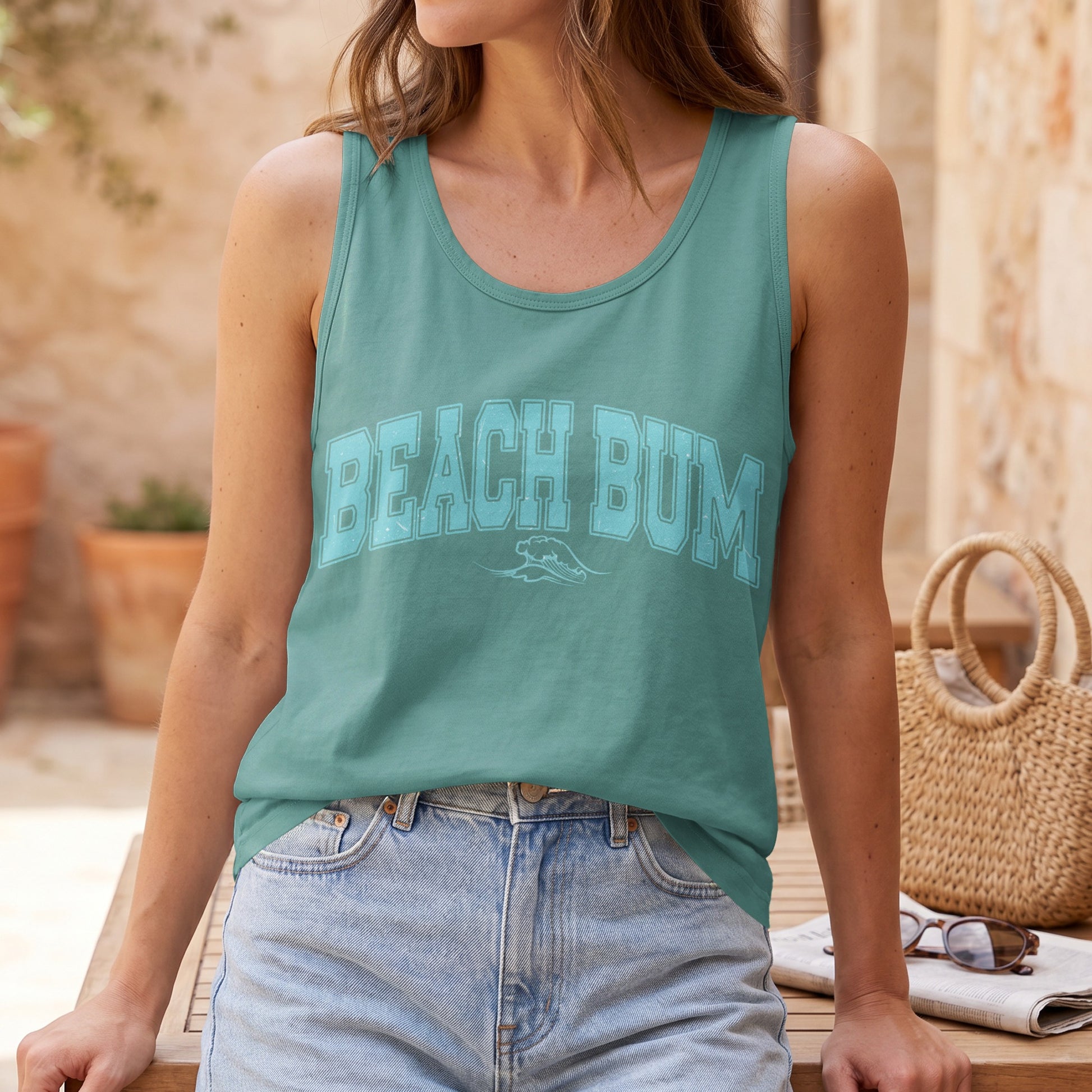 Teal tank top with "BEACH BUM" text and wave graphic.