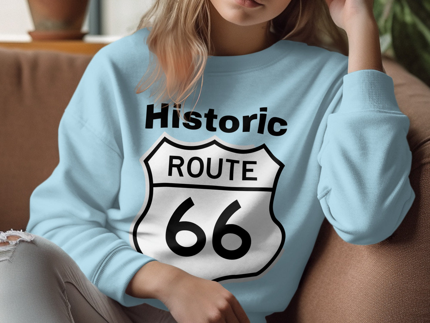Light blue sweatshirt with black and white Route 66 shield logo.