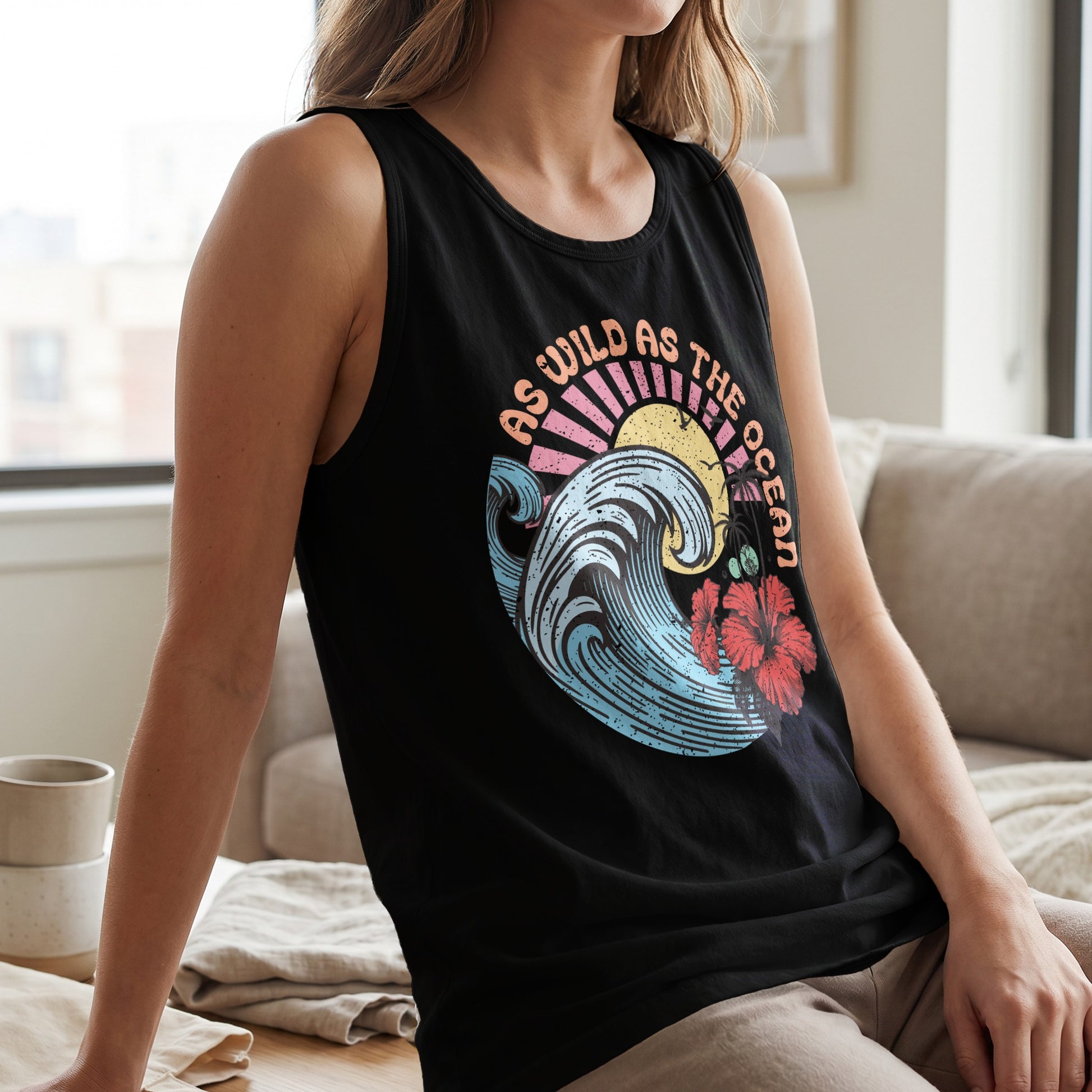Black tank top with "As Wild As The Ocean" text and a wave graphic.