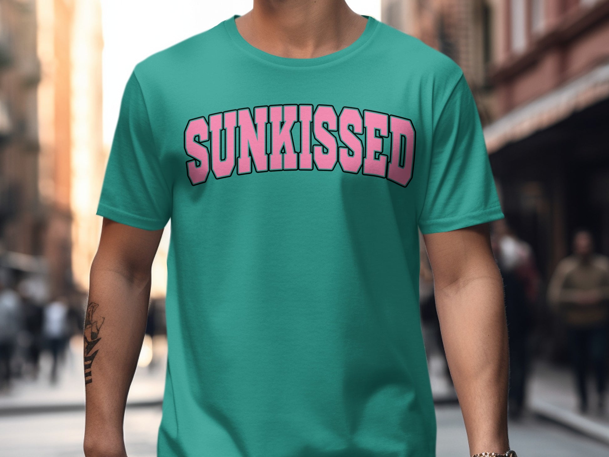 Teal t-shirt with pink "SUNKISSED" text.