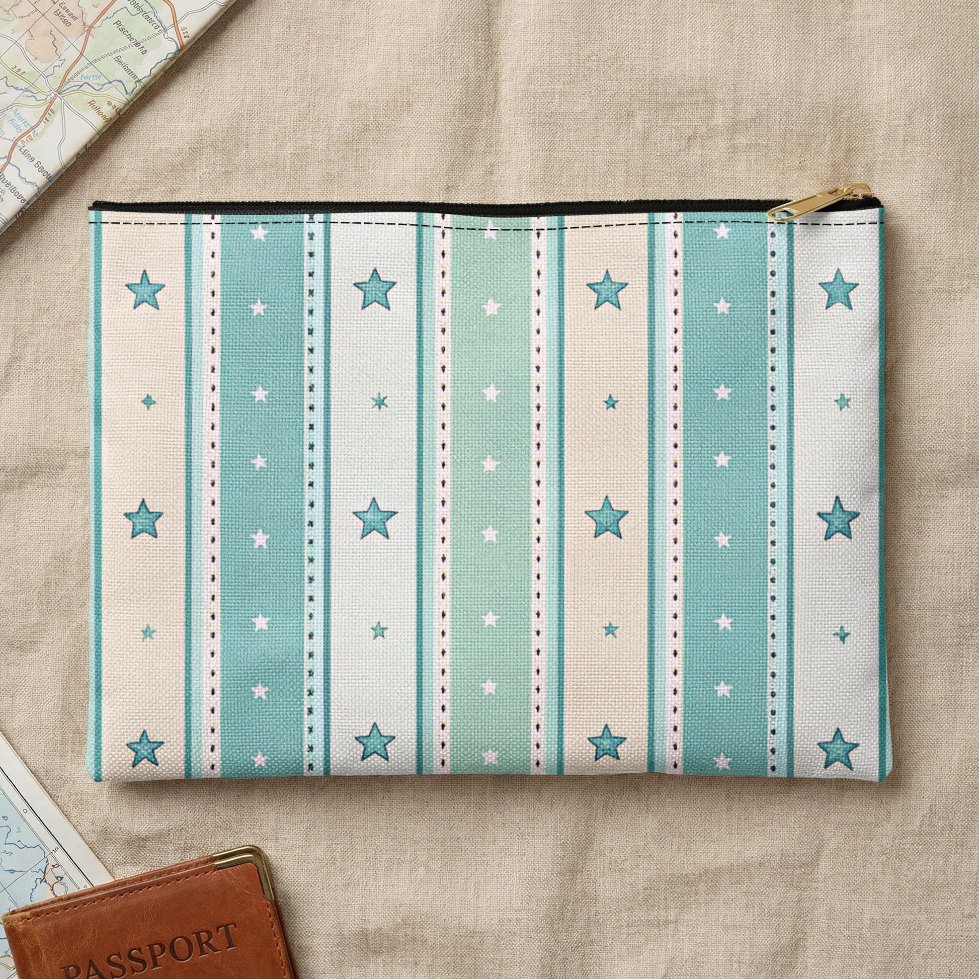 Zippered pouch with blue and tan stripes, white stars, and gold zipper.