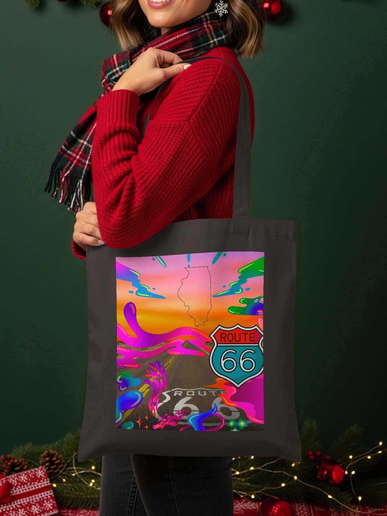 Dark tote bag with colorful Route 66 Illinois graphic and woman in sweater.