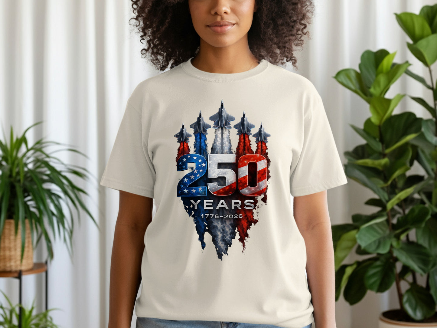 T-shirt with 250 Years 1776-2026 patriotic design and fighter jets.