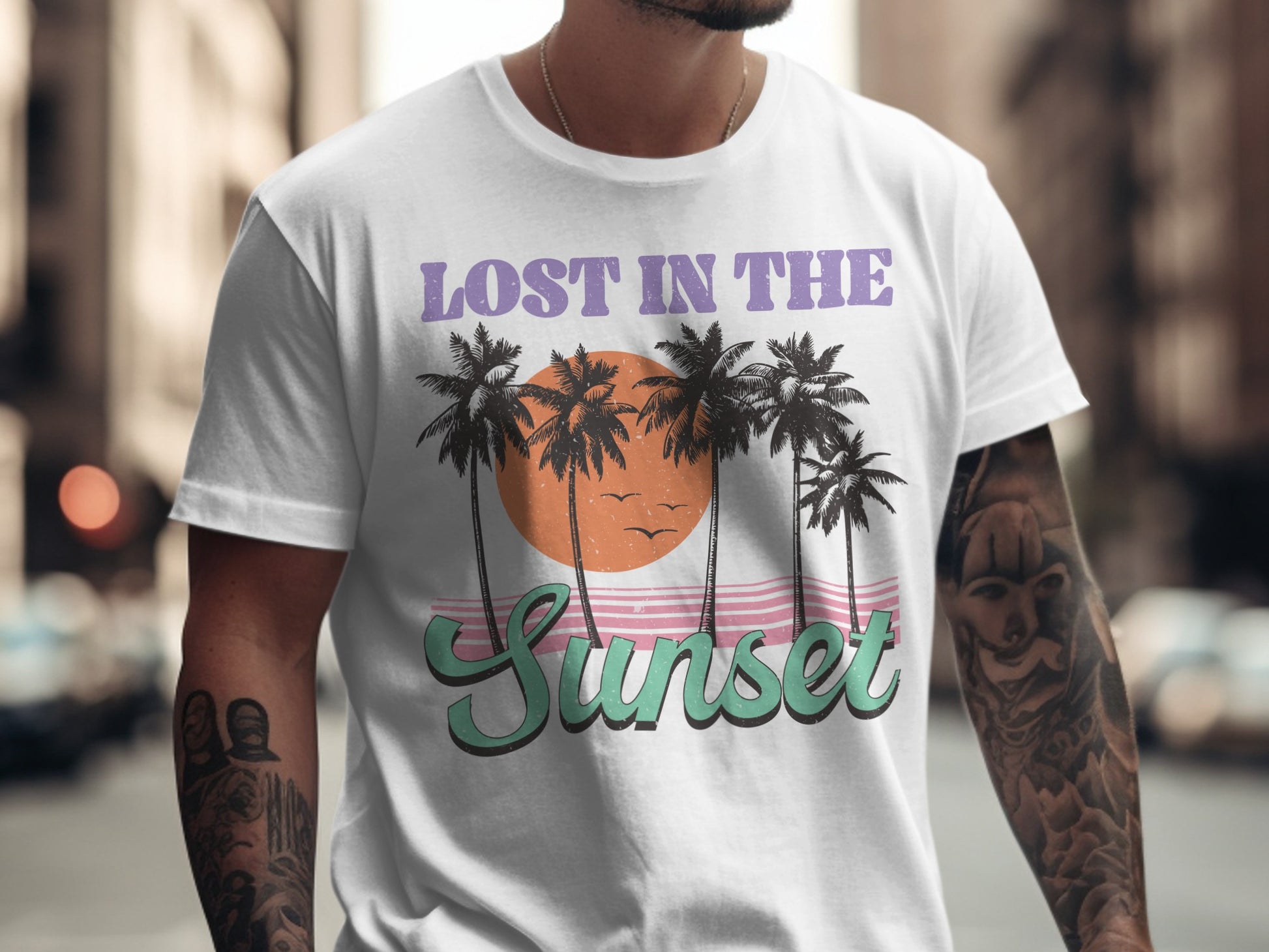 White t-shirt with "Lost in the Sunset" text and palm trees.