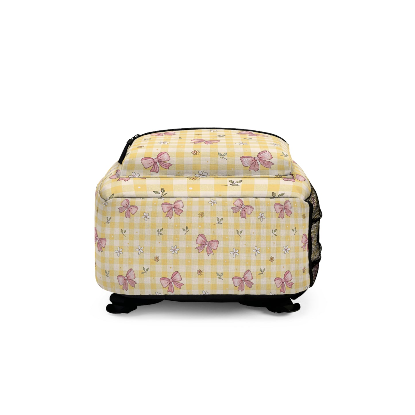 Yellow backpack with gingham pattern and pink bows and flowers.