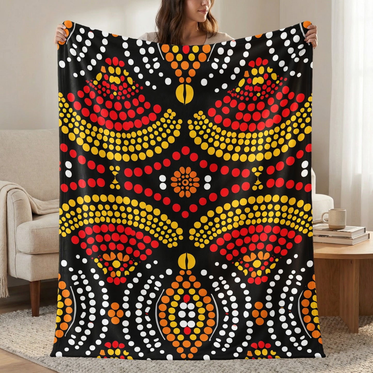Black fleece throw blanket with red, yellow, and white dot art pattern.
