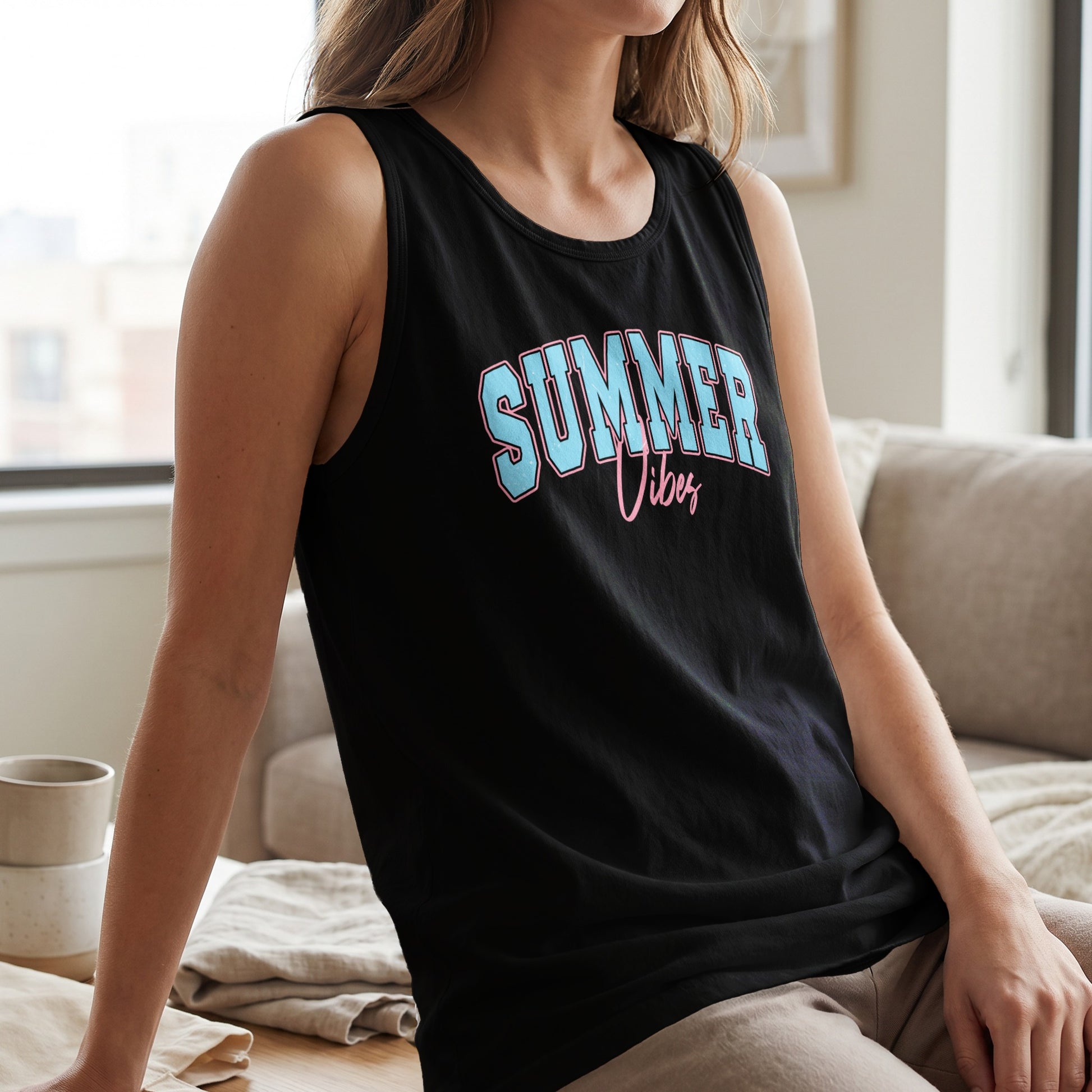 Black tank top with "SUMMER VIBES" in blue and pink text.