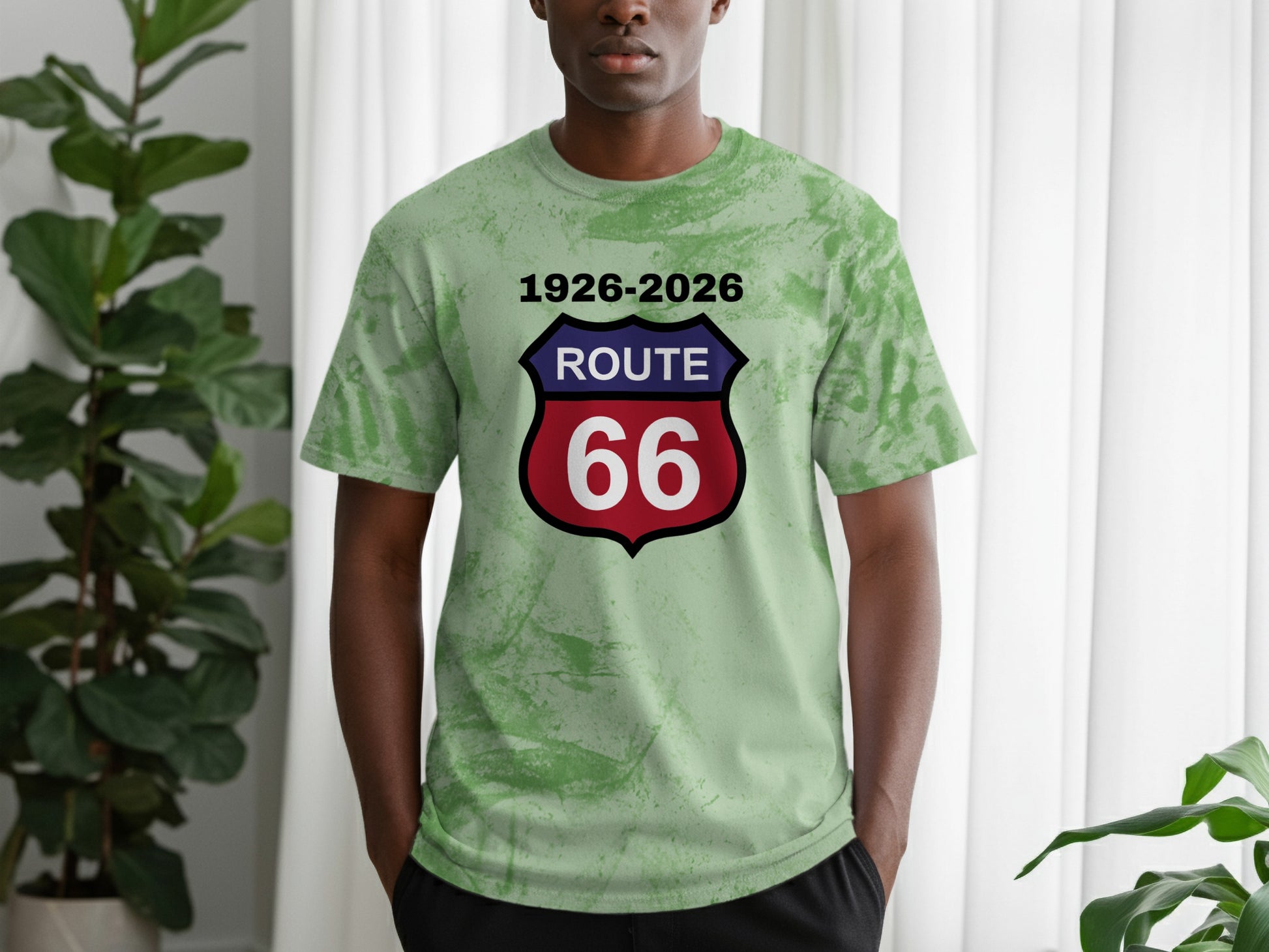 Green tie-dye t-shirt featuring the Route 66 shield logo with dates 1926-2026.