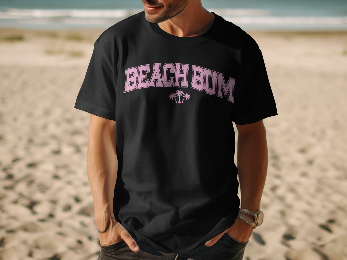Black t-shirt with "Beach Bum" text and palm trees in pink.