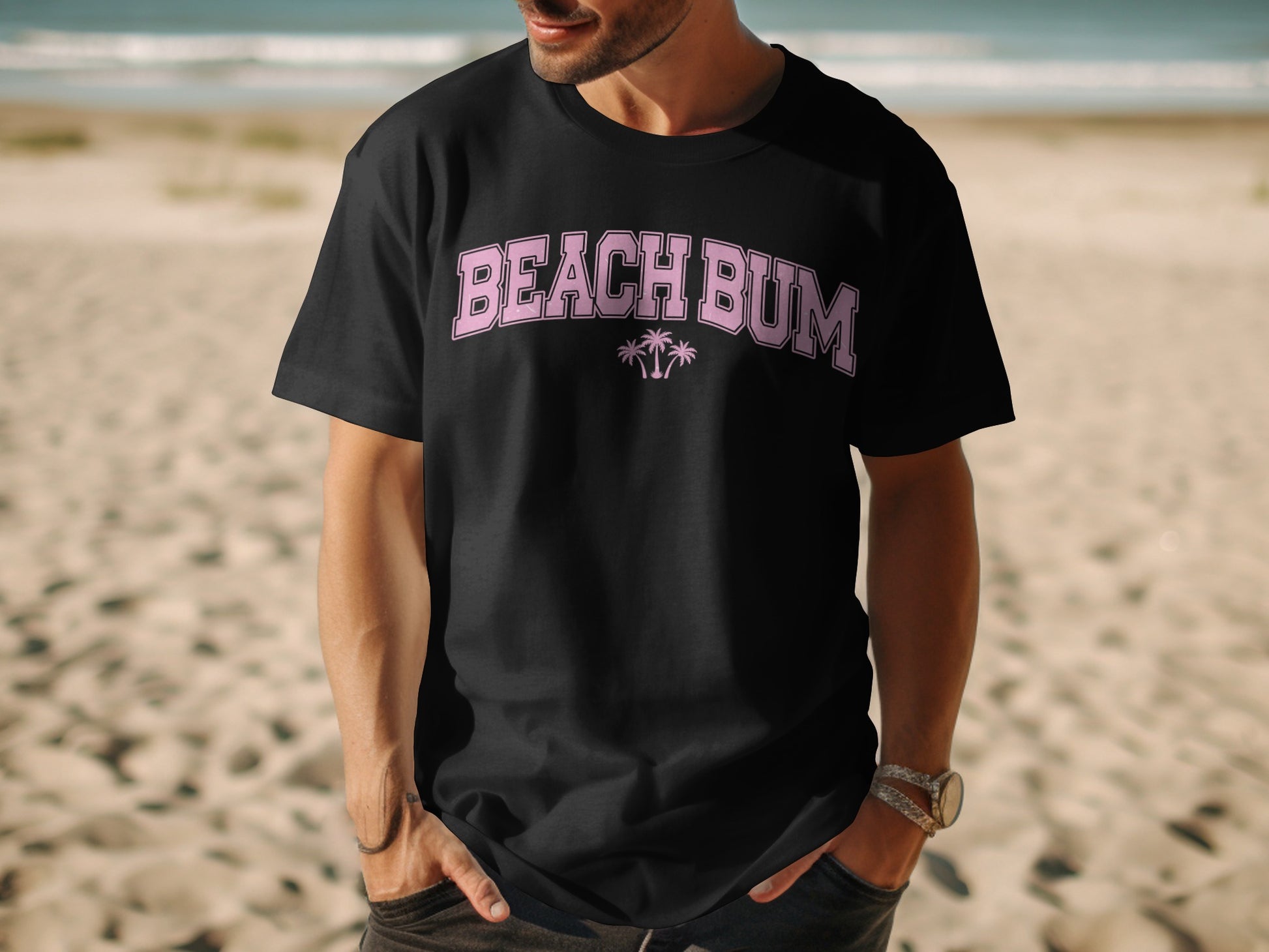 Black t-shirt with "Beach Bum" text and palm trees in pink.