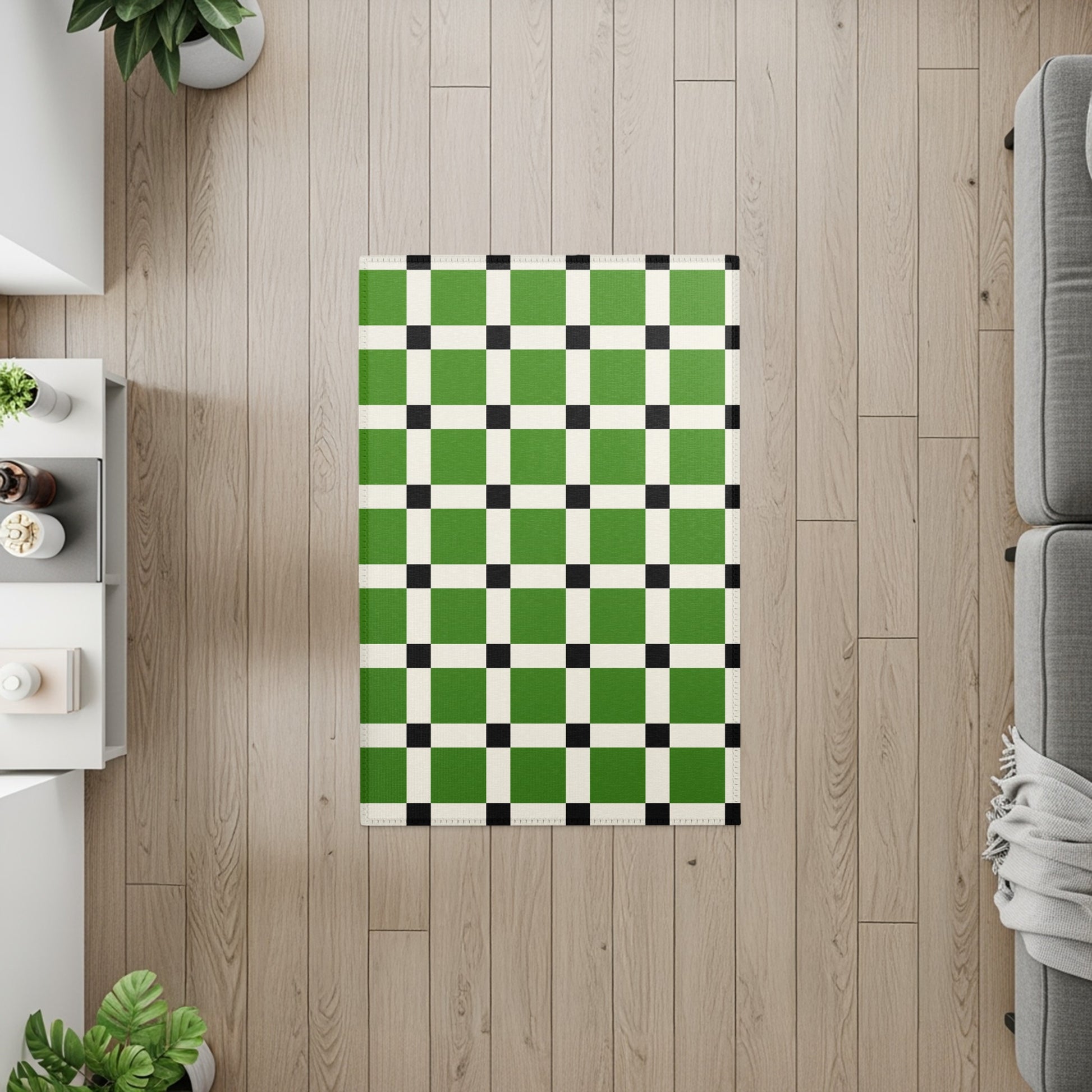 Green, white, and black checkered rug on a light wood floor.