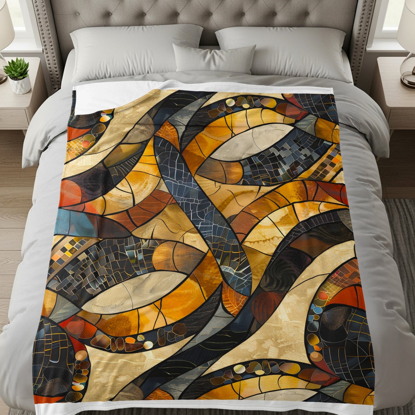 Abstract stained glass pattern blanket in warm tones with curved lines and segmented sections.