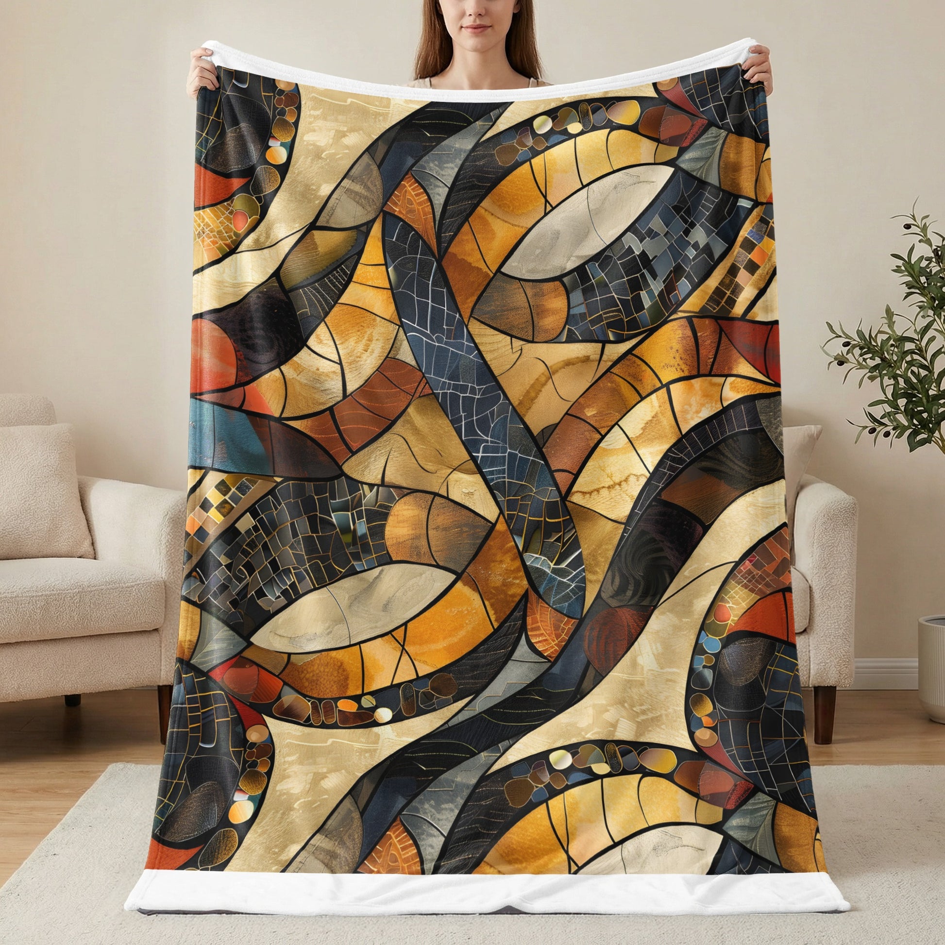 Blanket with abstract stained glass pattern in warm earth tones.