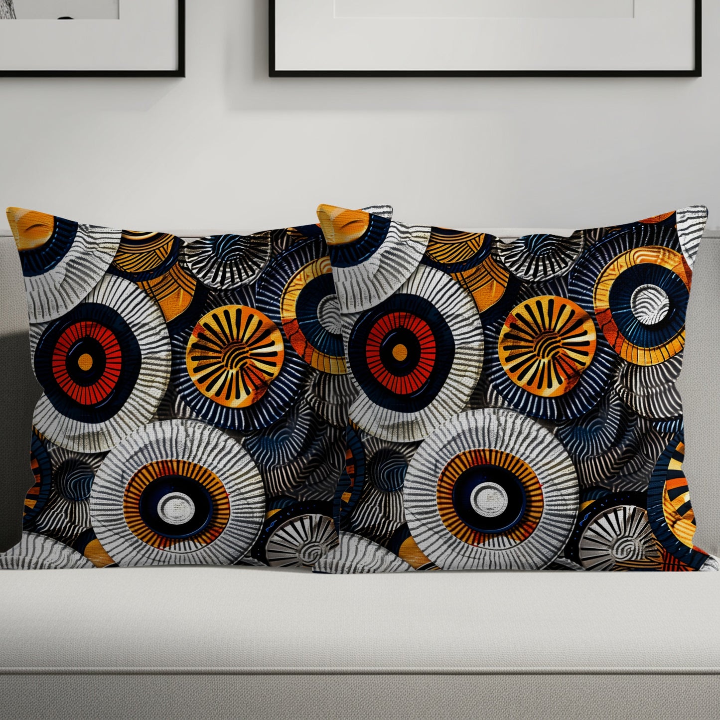 Two rectangular throw pillows with a colorful circular and striped abstract pattern.