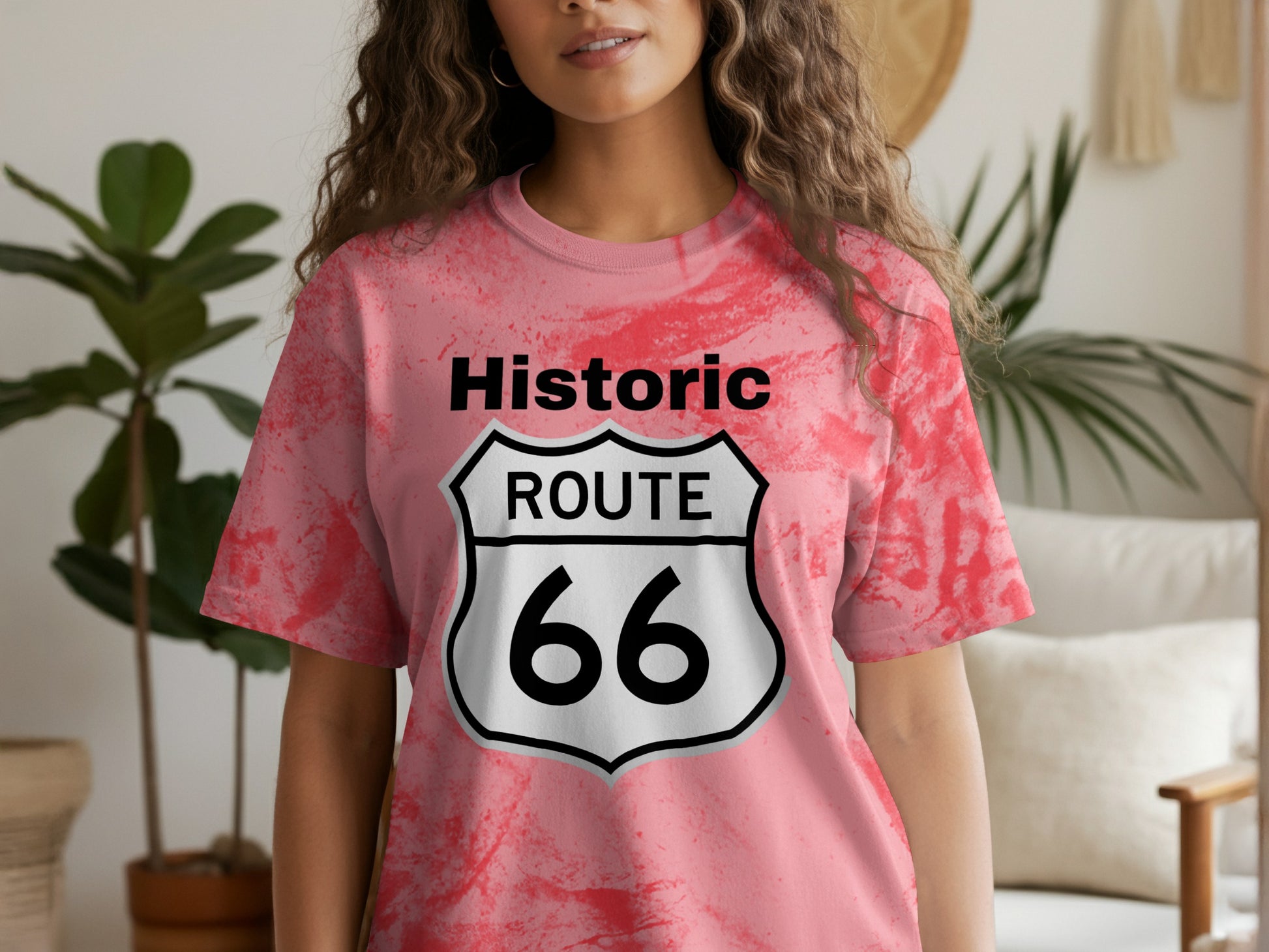 Pink tie-dye t-shirt featuring the historic Route 66 shield logo.