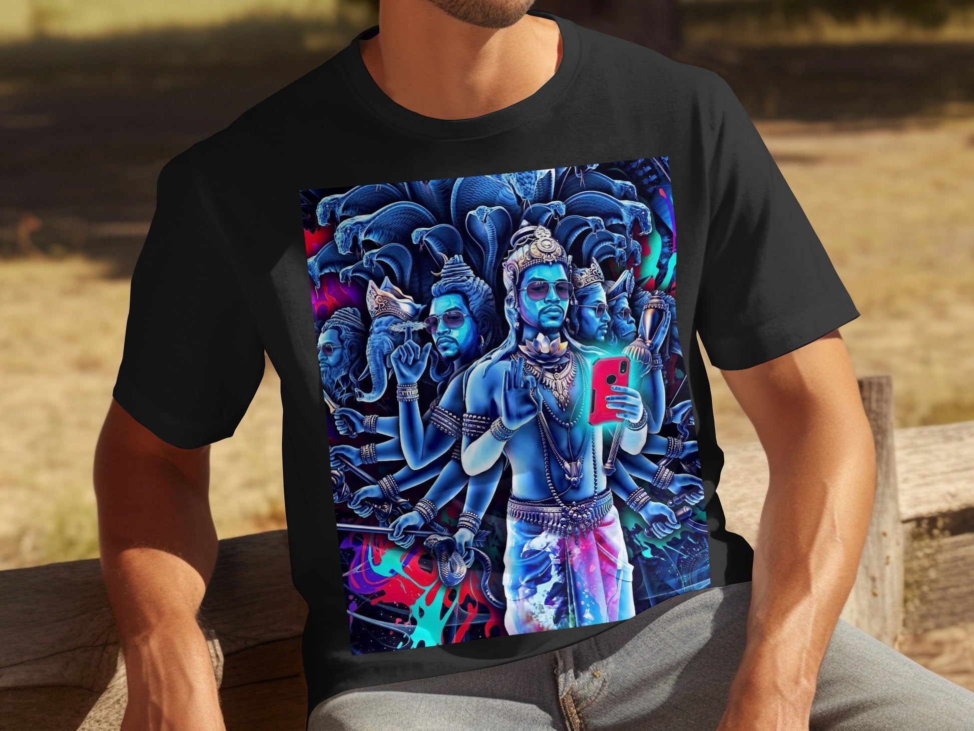 Black t-shirt with a vibrant, multi-armed deity holding a smartphone.