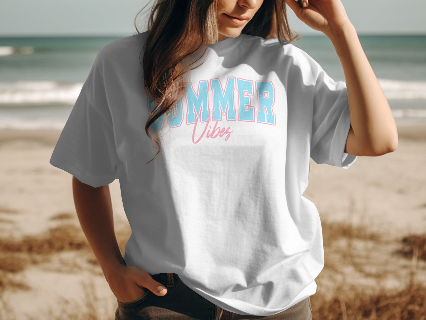 White t-shirt with "SUMMER Vibes" text in light blue and pink.