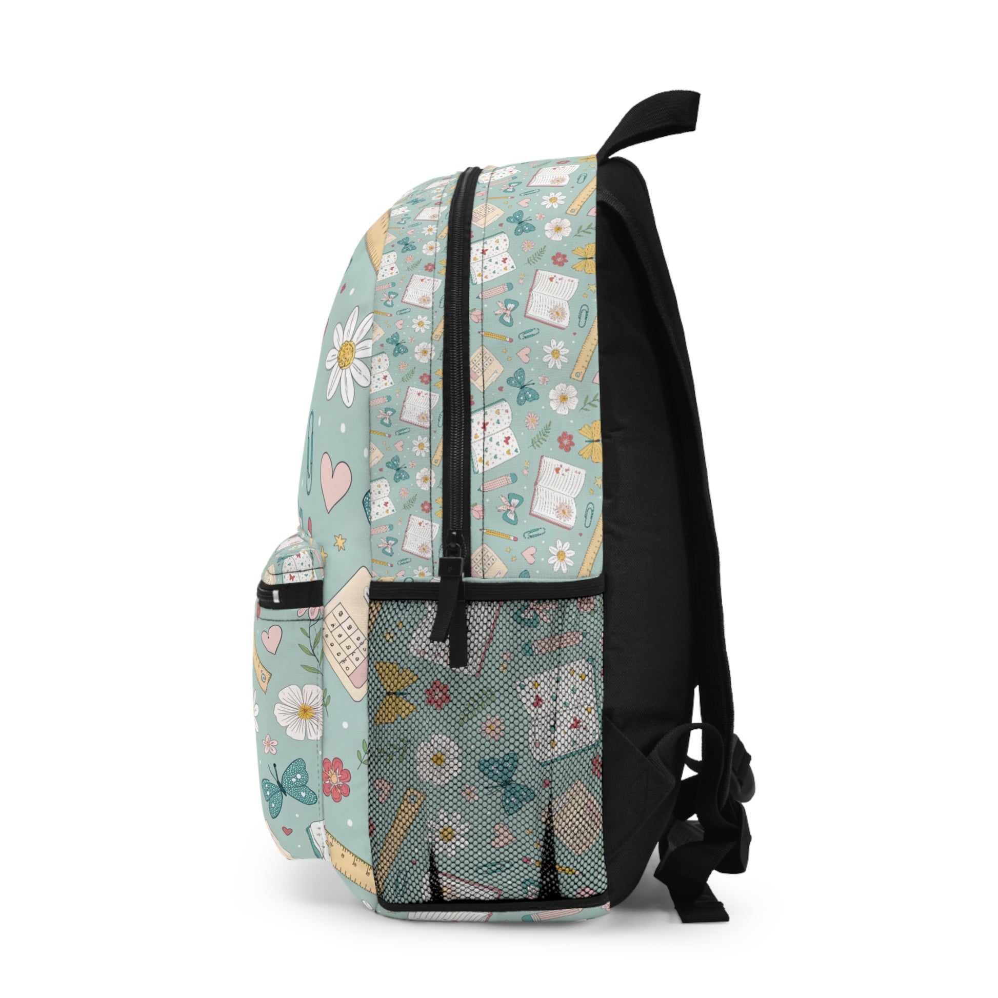 Light blue backpack with school-themed pattern and black straps.
