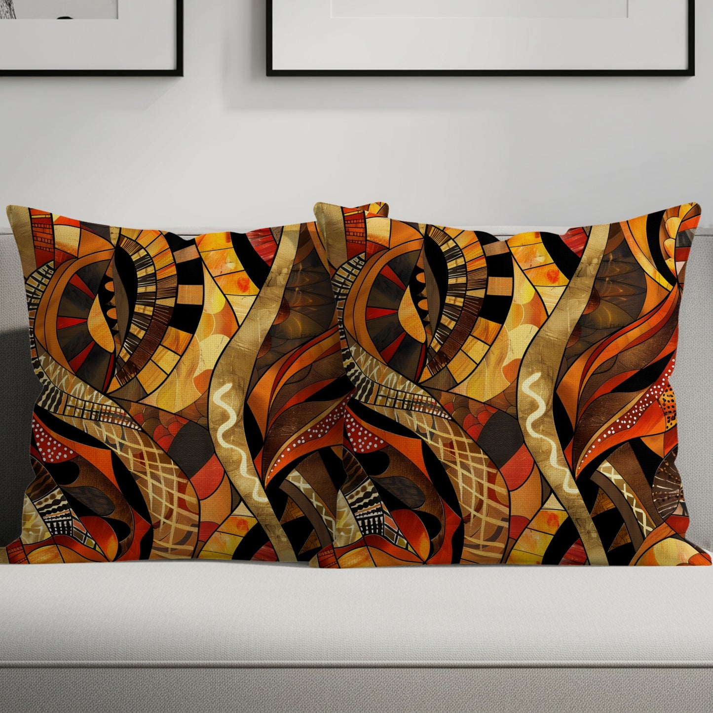 Two lumbar pillows with an abstract, geometric pattern in warm tones of orange and brown.