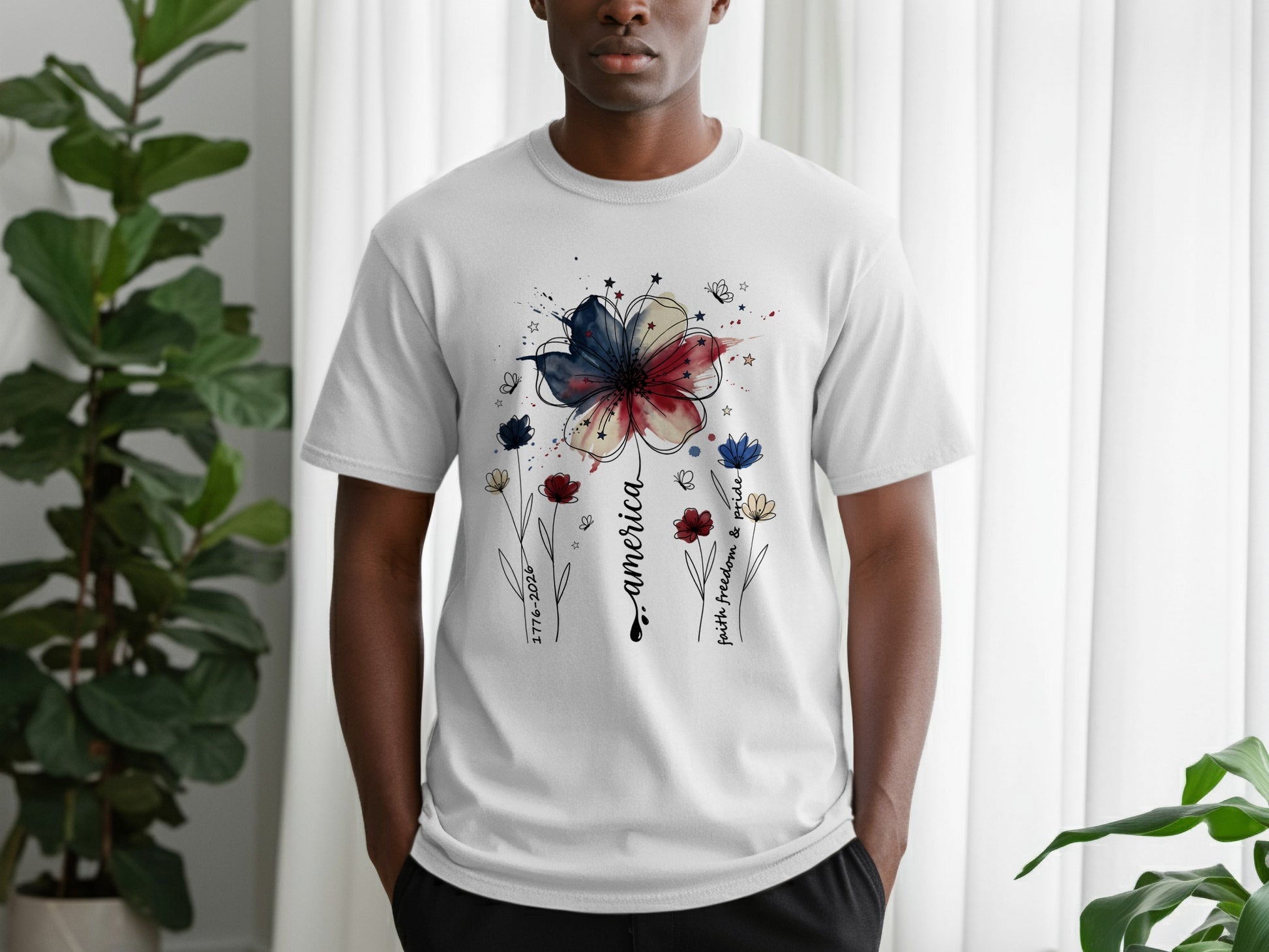 White t-shirt with red, white, and blue flower graphic and "America" text.