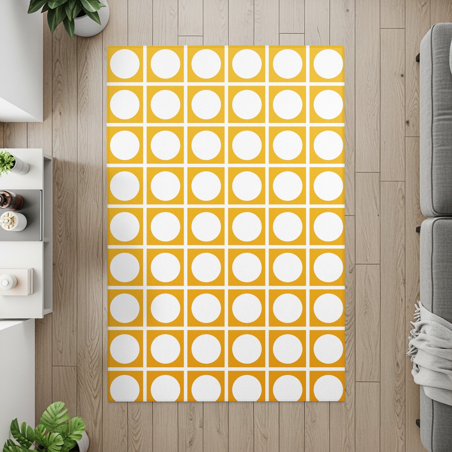 Yellow and white grid pattern rug with circles on a wood floor.