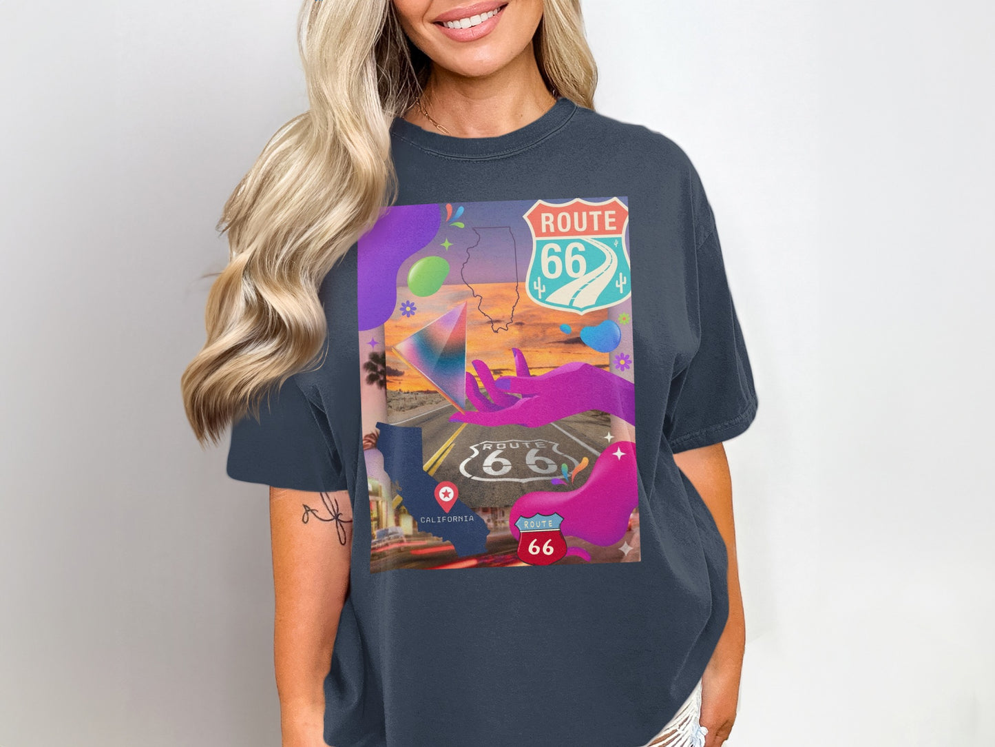 Woman wearing a t-shirt with Route 66 graphic featuring California map and colorful elements.