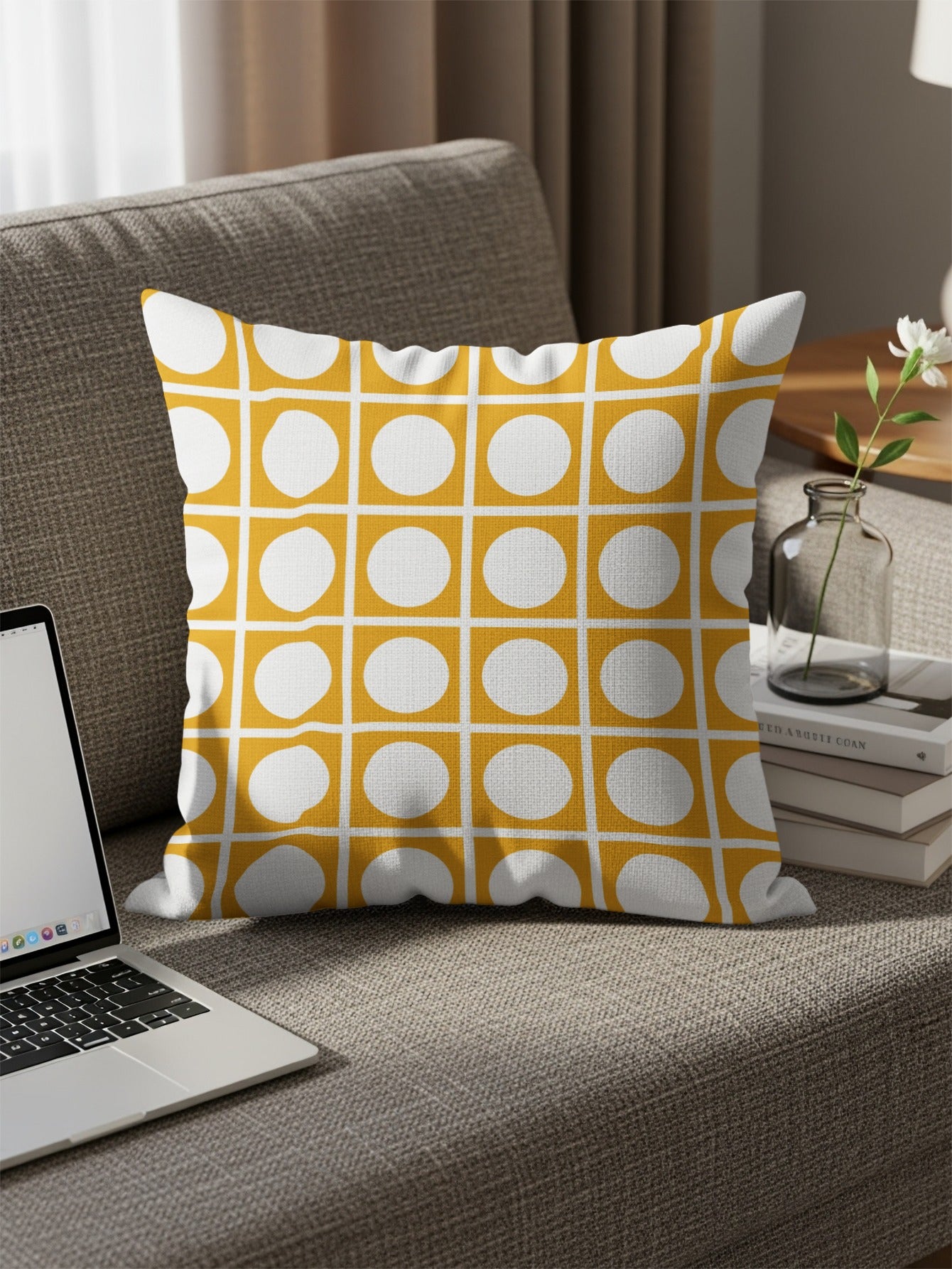 Cushion with yellow background and a grid of white circles.
