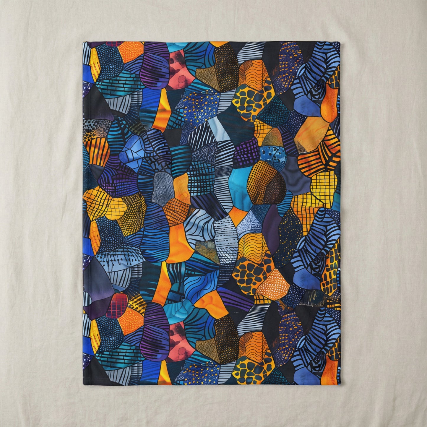 Colorful abstract patchwork fabric with various patterns and shapes.