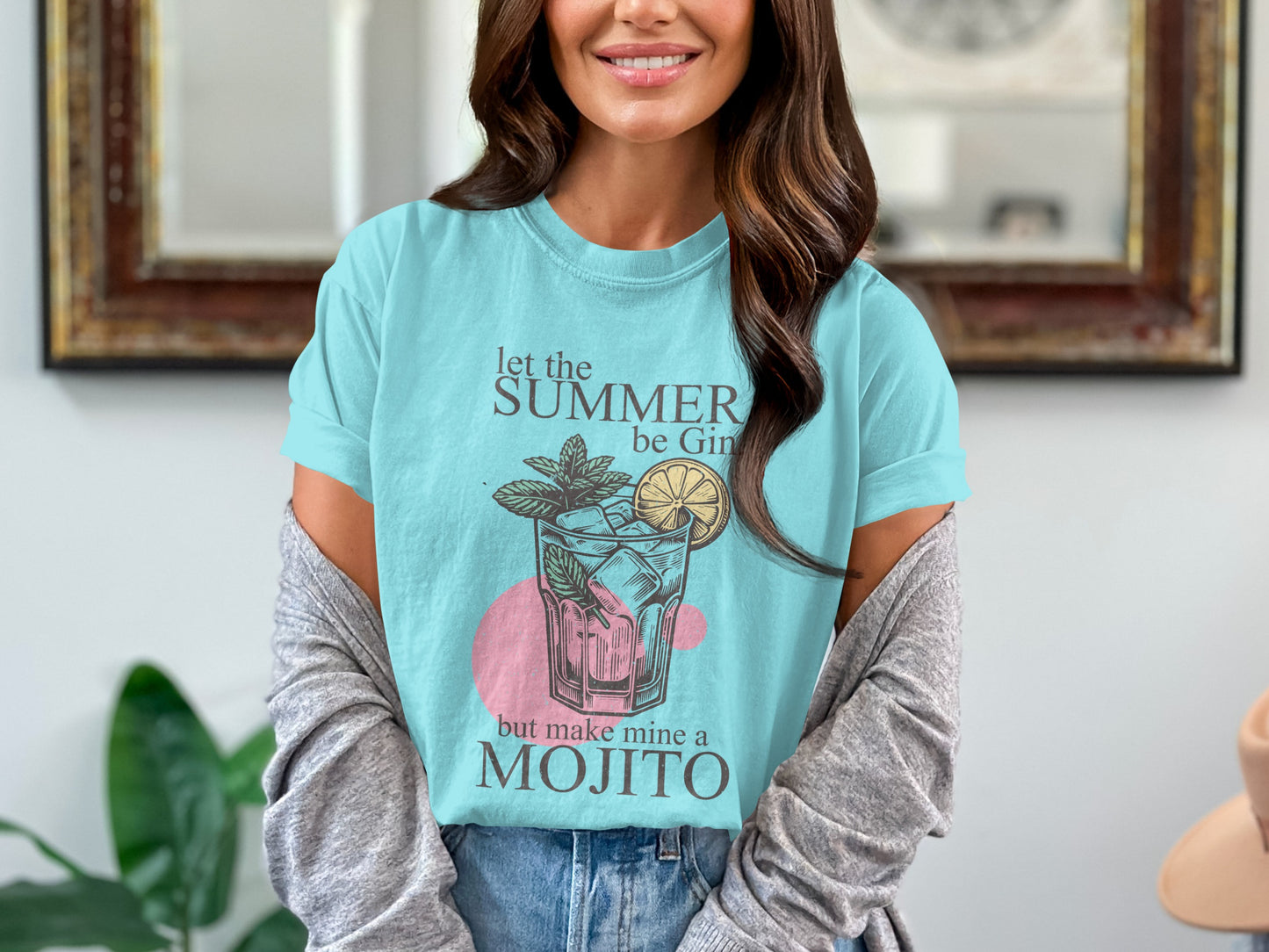 Light blue t-shirt with "let the SUMMER be Gin but make mine a MOJITO" and a drink illustration.