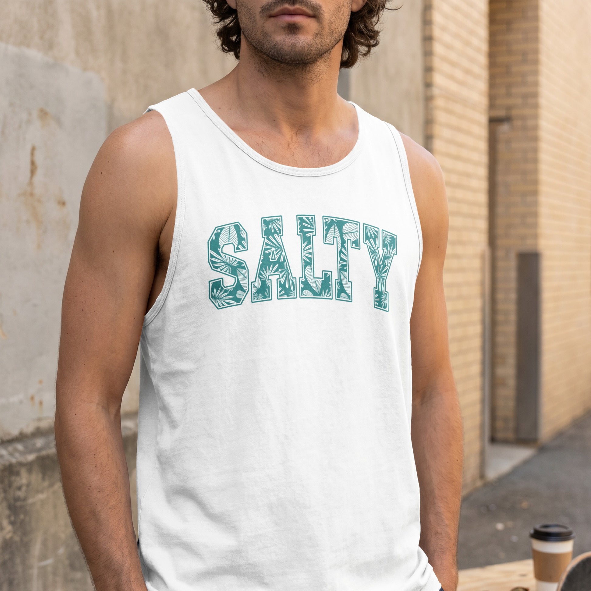 White tank top with "Salty" text in a tropical leaf pattern.