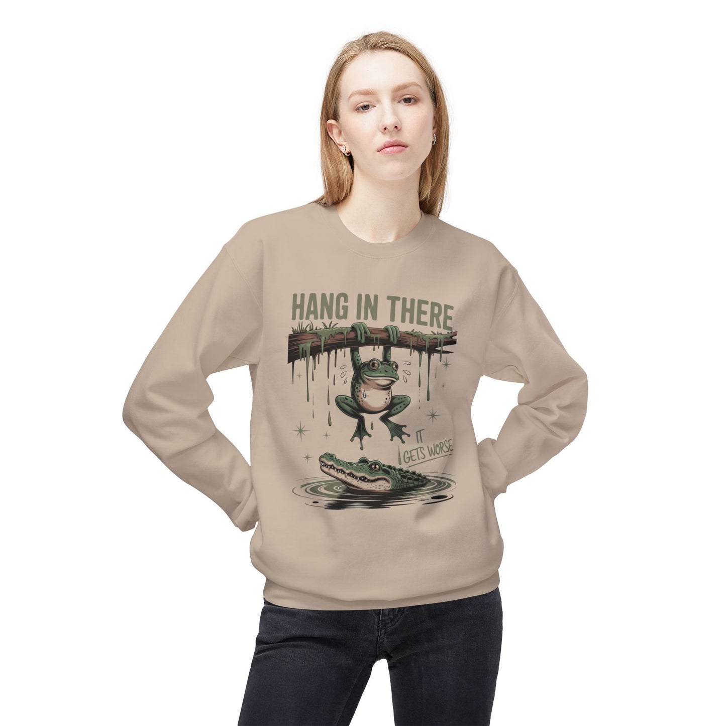 Sand sweatshirt with a frog hanging from a branch over an alligator.