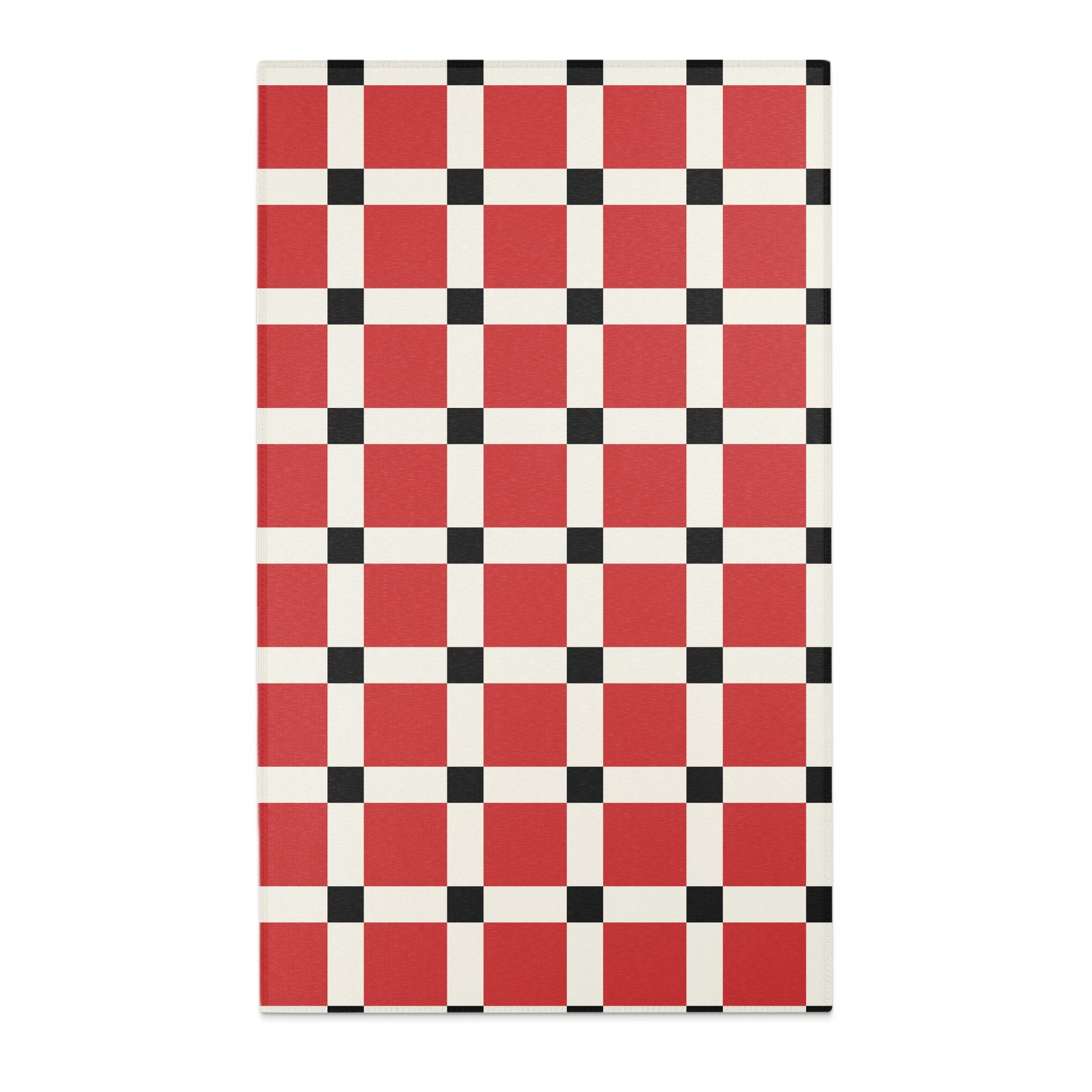 Red, white, and black checkered pattern on a rug.