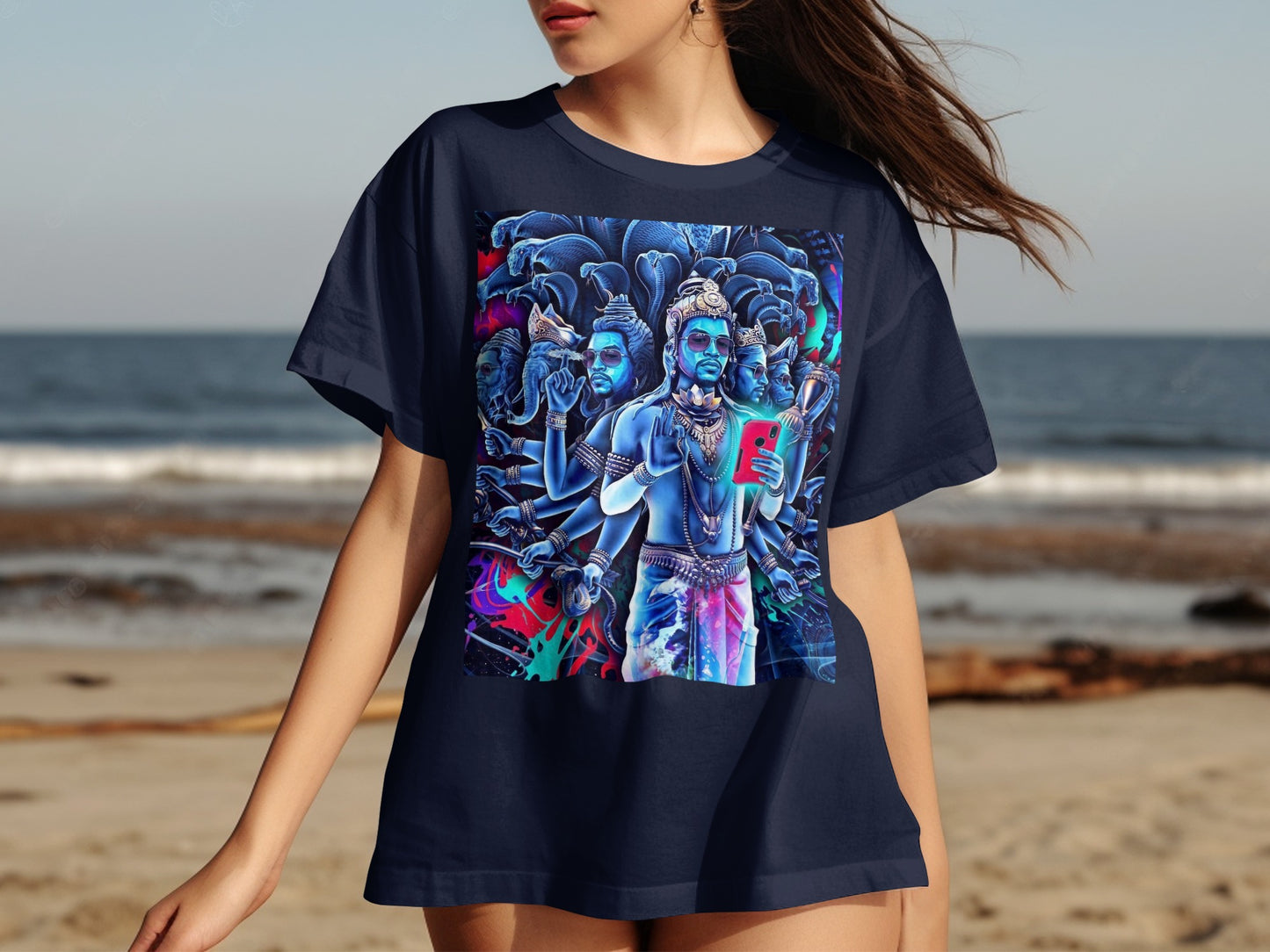 Dark blue t-shirt with vibrant depiction of multiple-armed Hindu deity holding a smartphone.