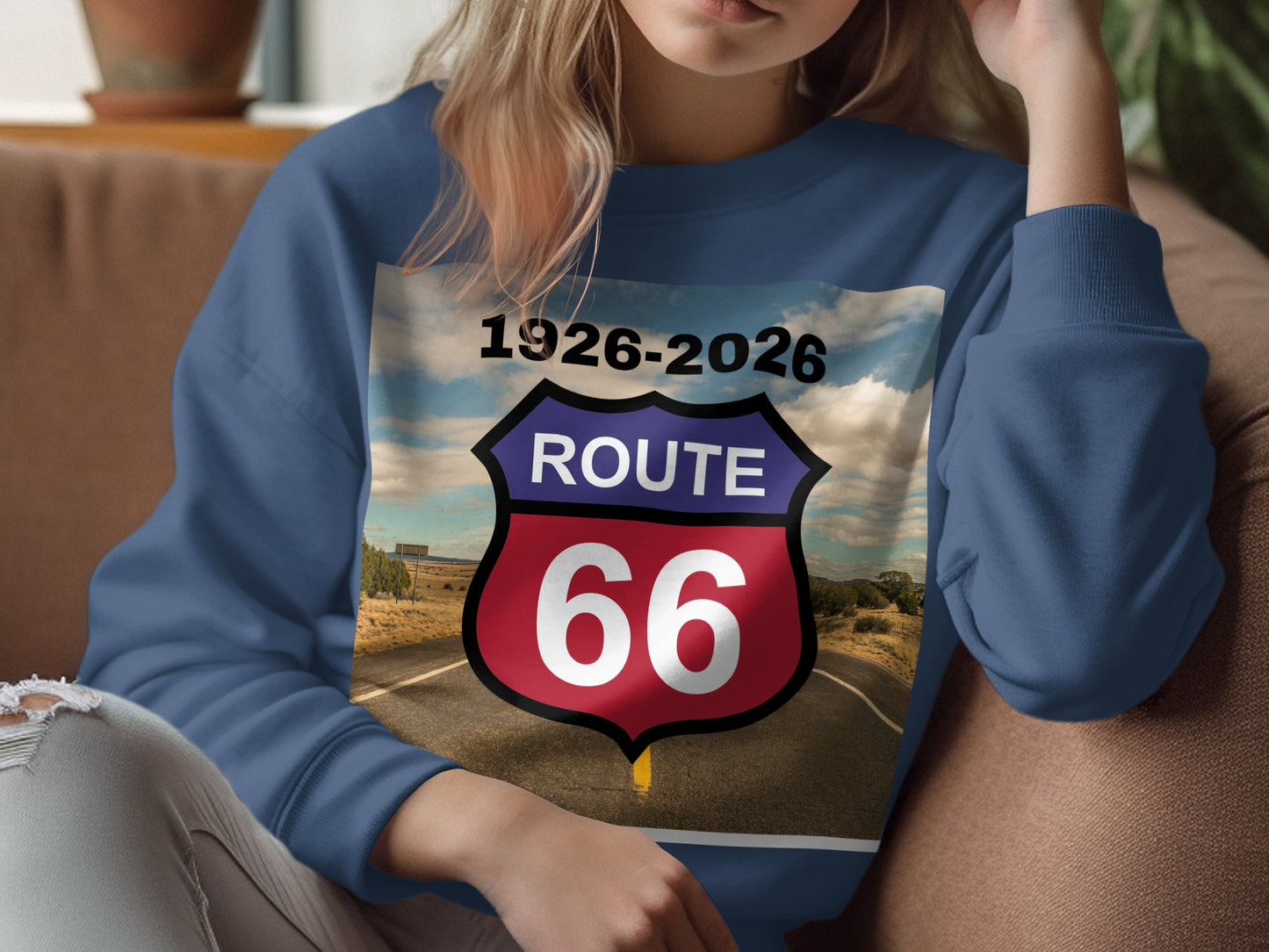 Blue sweatshirt with "Route 66" logo and dates 1926-2026.