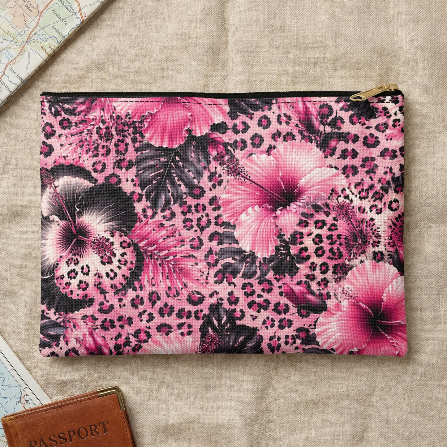 Pink hibiscus and leopard print zippered pouch with gold zipper pull.