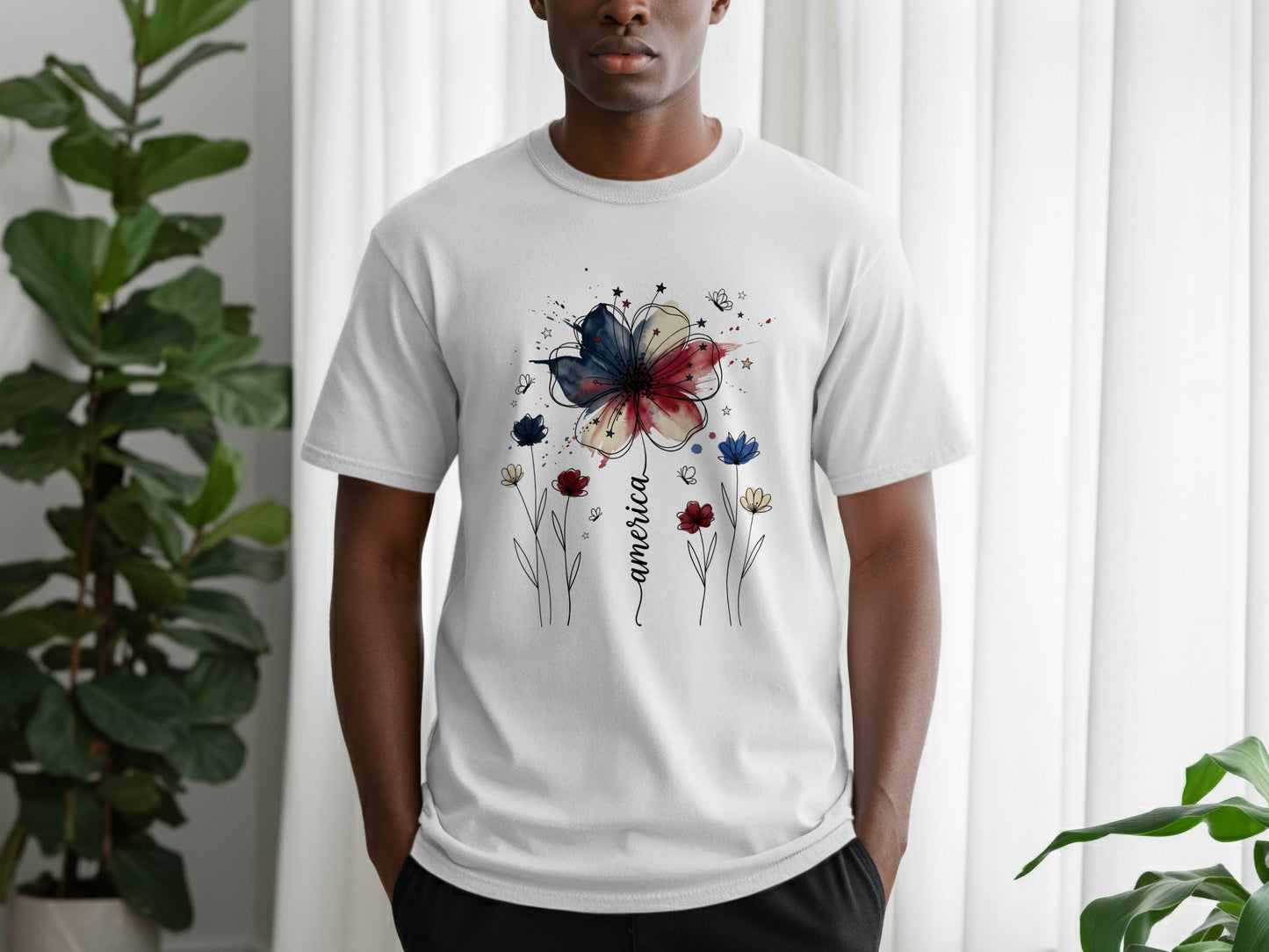 White t-shirt with red, white, and blue floral watercolor design and "america" text.