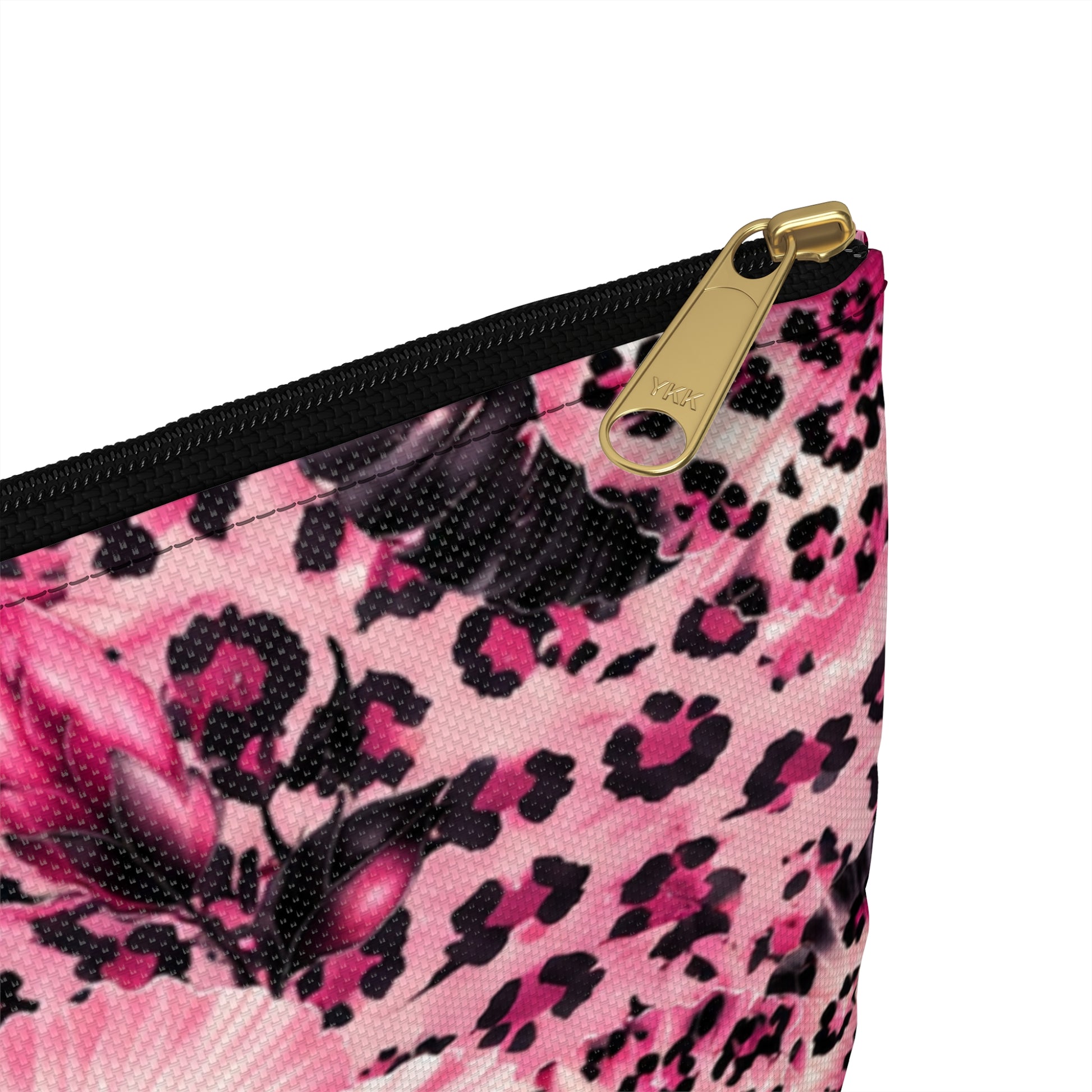 Pink leopard print cosmetic bag with a gold YKK zipper.