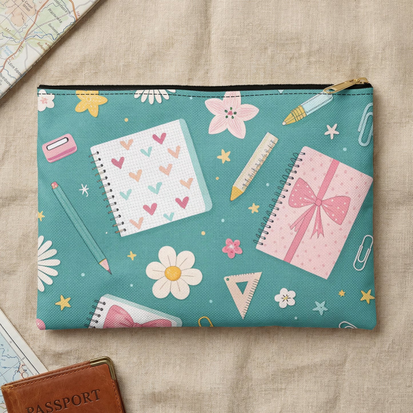 Turquoise pouch with school supplies and flowers pattern.