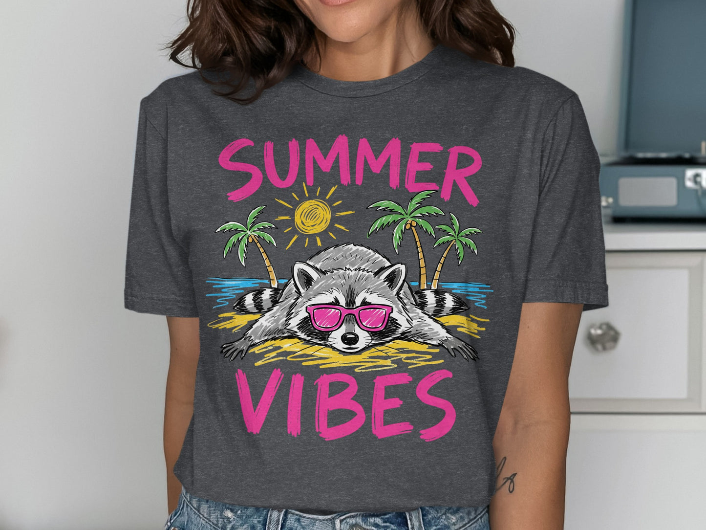 Raccoon in sunglasses on a beach with "SUMMER VIBES" text.
