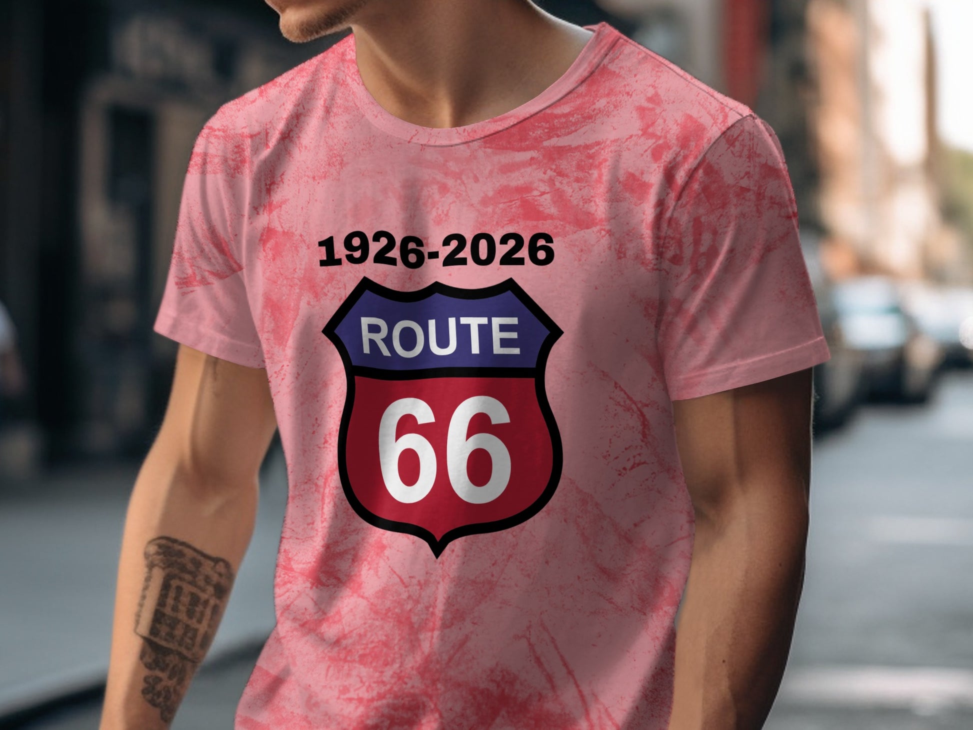 Pink tie-dye t-shirt with Route 66 logo and dates 1926-2026.