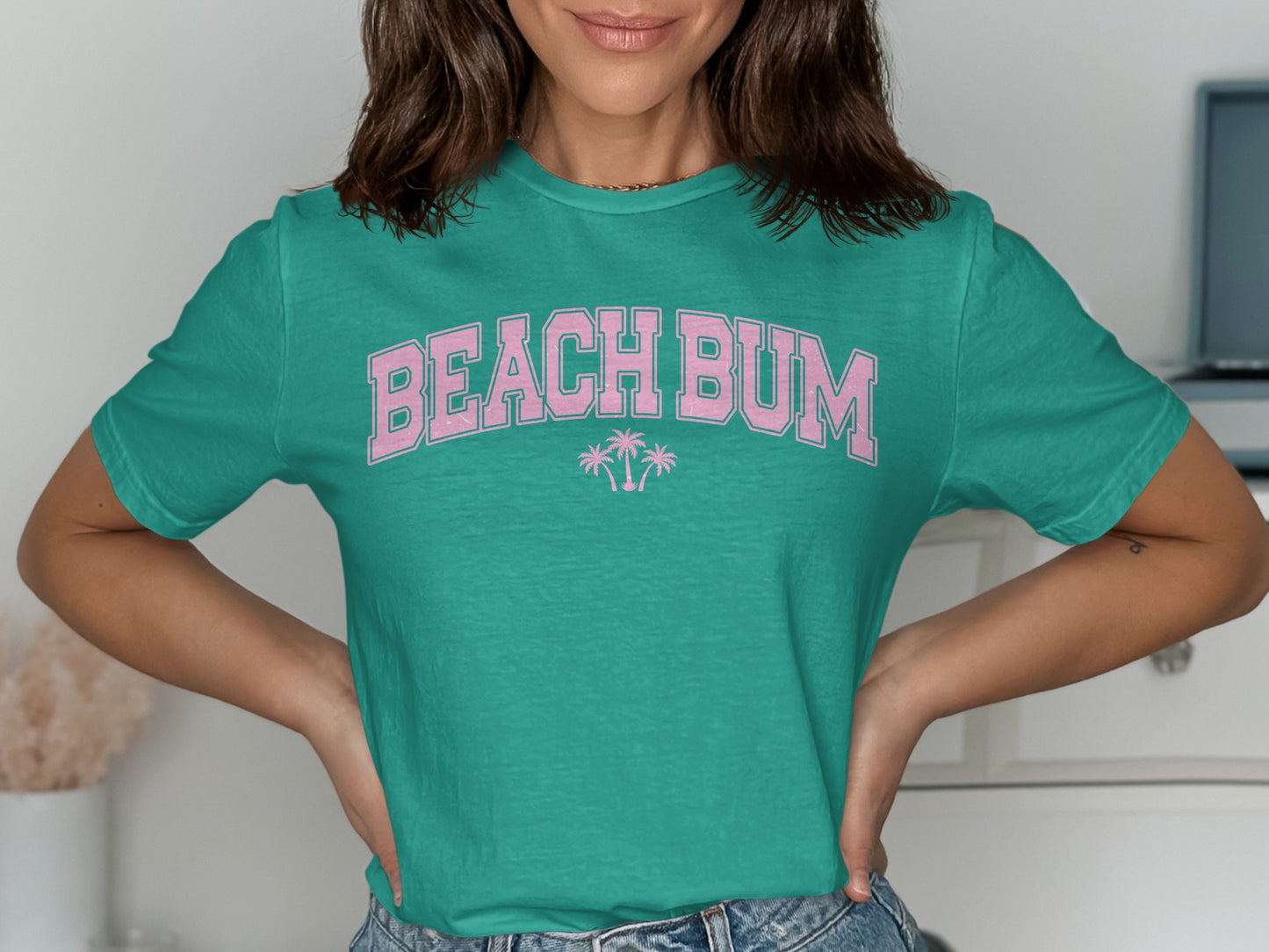 Teal t-shirt with "BEACH BUM" and palm trees in pink.