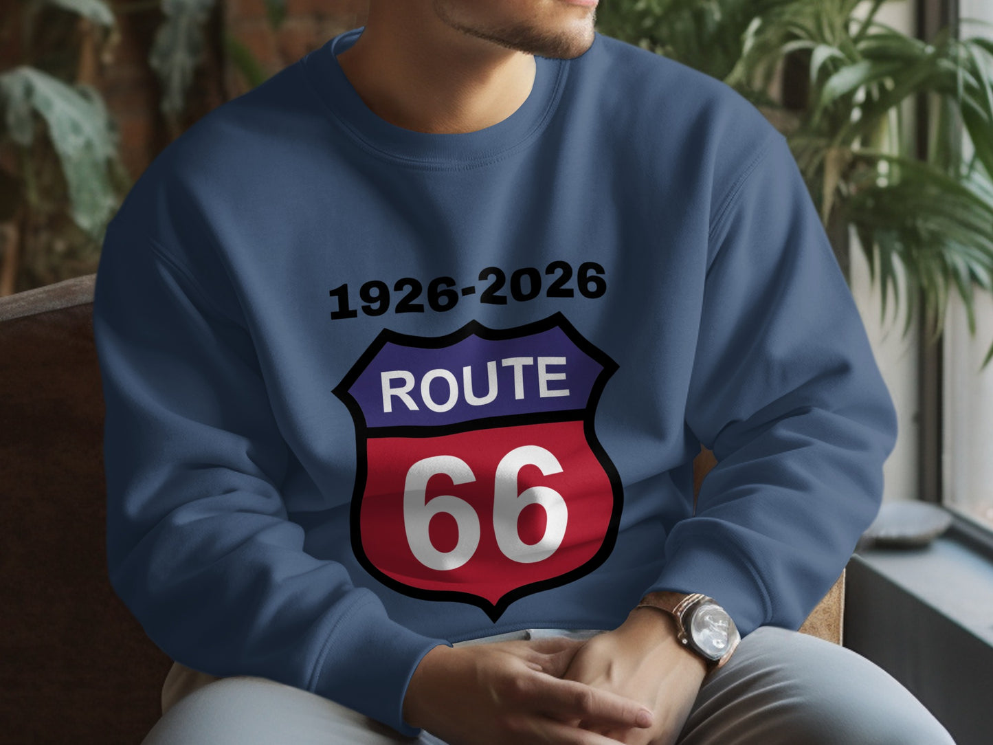 Navy sweatshirt with Route 66 shield logo and dates 1926-2026.