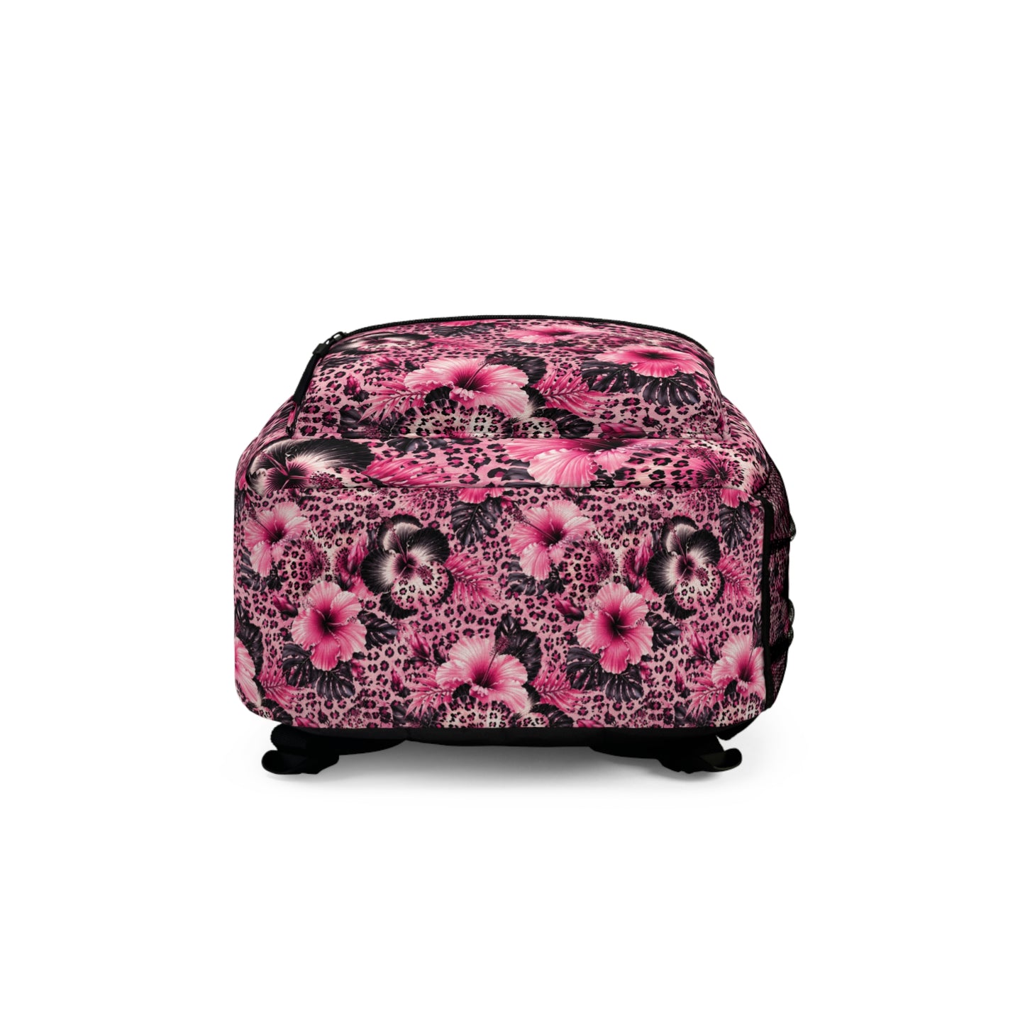 Pink backpack with a floral and leopard print pattern.