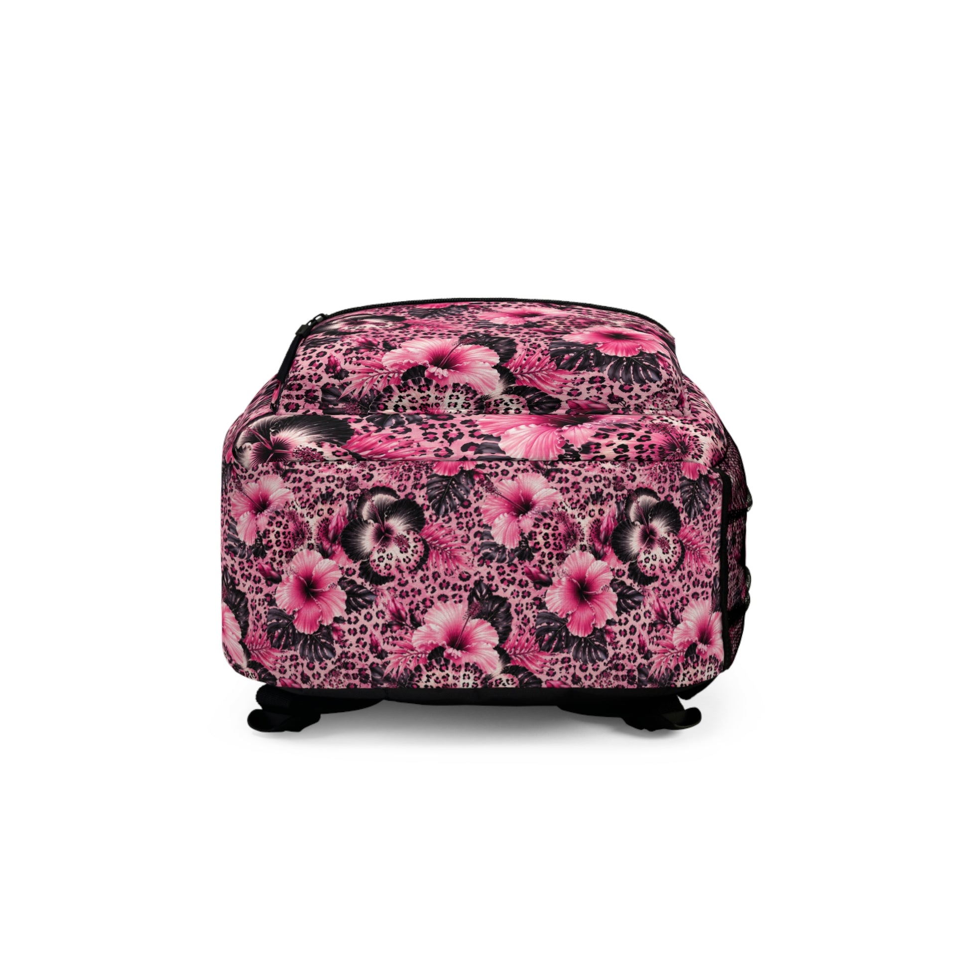 Pink backpack with a floral and leopard print pattern.